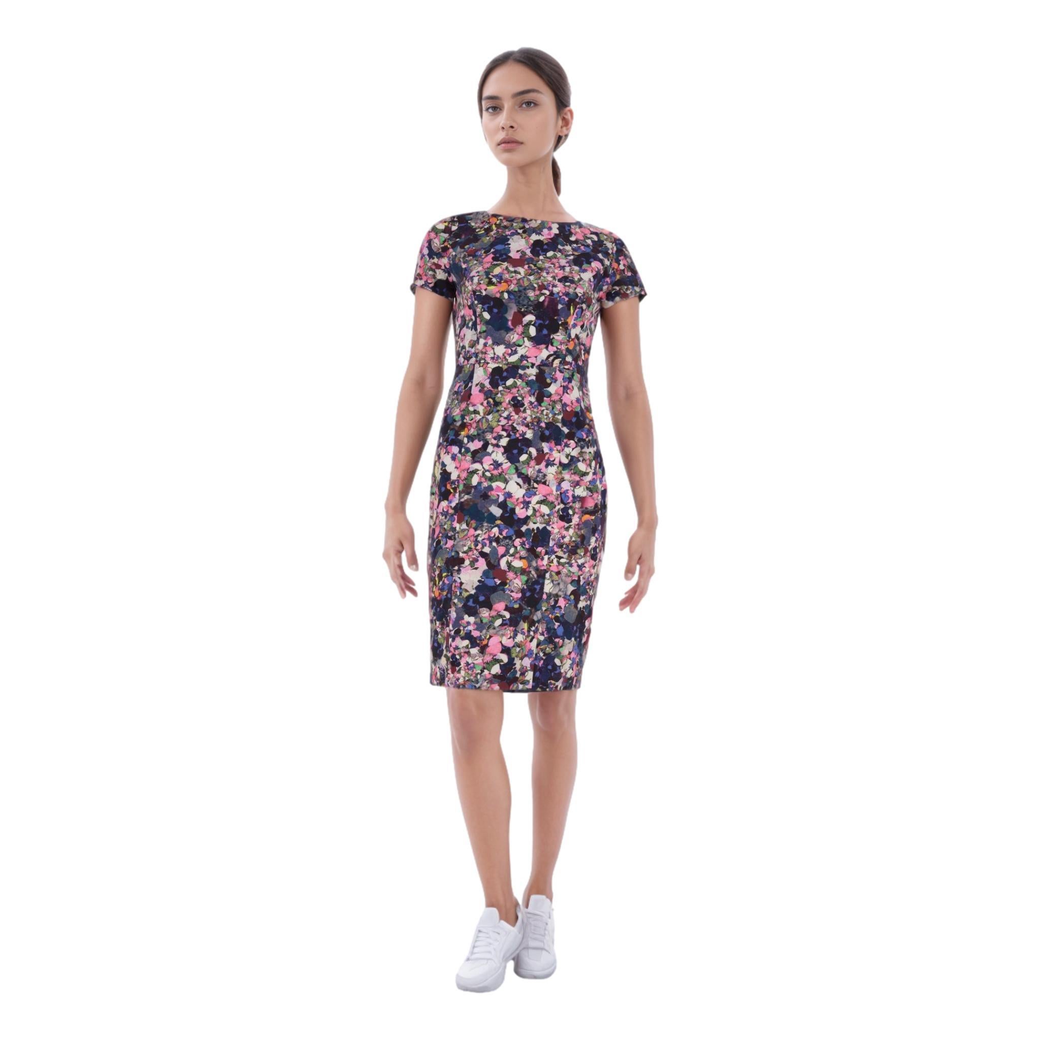 Erdem Cotton Blend Floral Print Sheath Dress

Multicoloured 'Joyce' short sleeved dress with all-over abstract floral print.

Featuring boat neckline, fitted bodice and straight falling skirt.

Rrp Approx. £750

Size – 12UK

Condition – Very