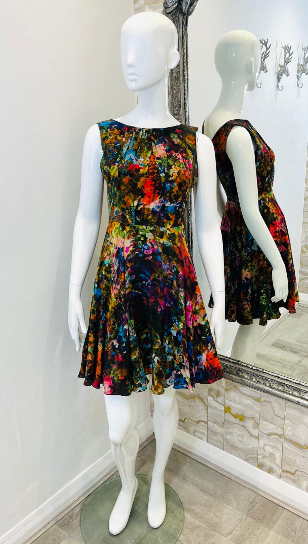 Erdem Fit & Flare Printed Silk Dress

Dark, multicoloured dress detailed with abstract/floral print and plisse detailing to the neckline.

Featuring pleated, mid-thigh length, flared skirt and sleeveless design.

Styled with boat neckline to the
