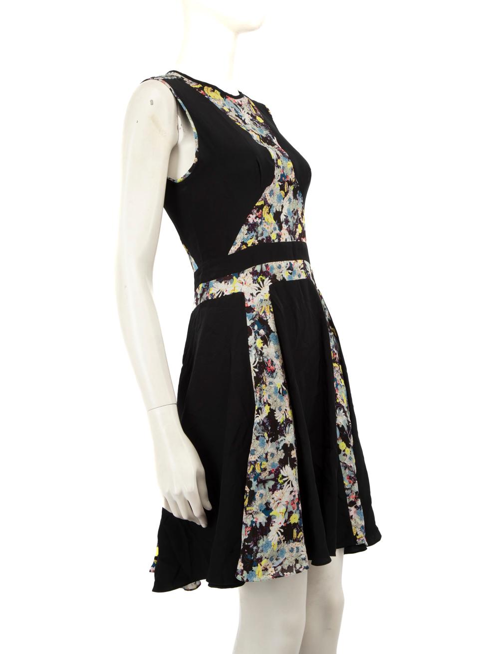 CONDITION is Very good. Minimal wear to the dress is evident. Missing size and composition label. Discolouration below the neckline on the front left and on the back left below the hip. One pull to the weave on the back right of the hip on this used