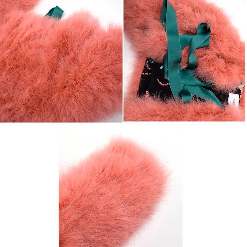 Erdem Ives Cropped Marabou Jacket.

Erdem Ives rose marabou feather cropped jacket featuring floral printed lining and light teal satin tie fastening at front.

Fabrics: 90% Feathers and 10% Nylon.

Size: S. 

Condition: 9.5/10. Hardly ever