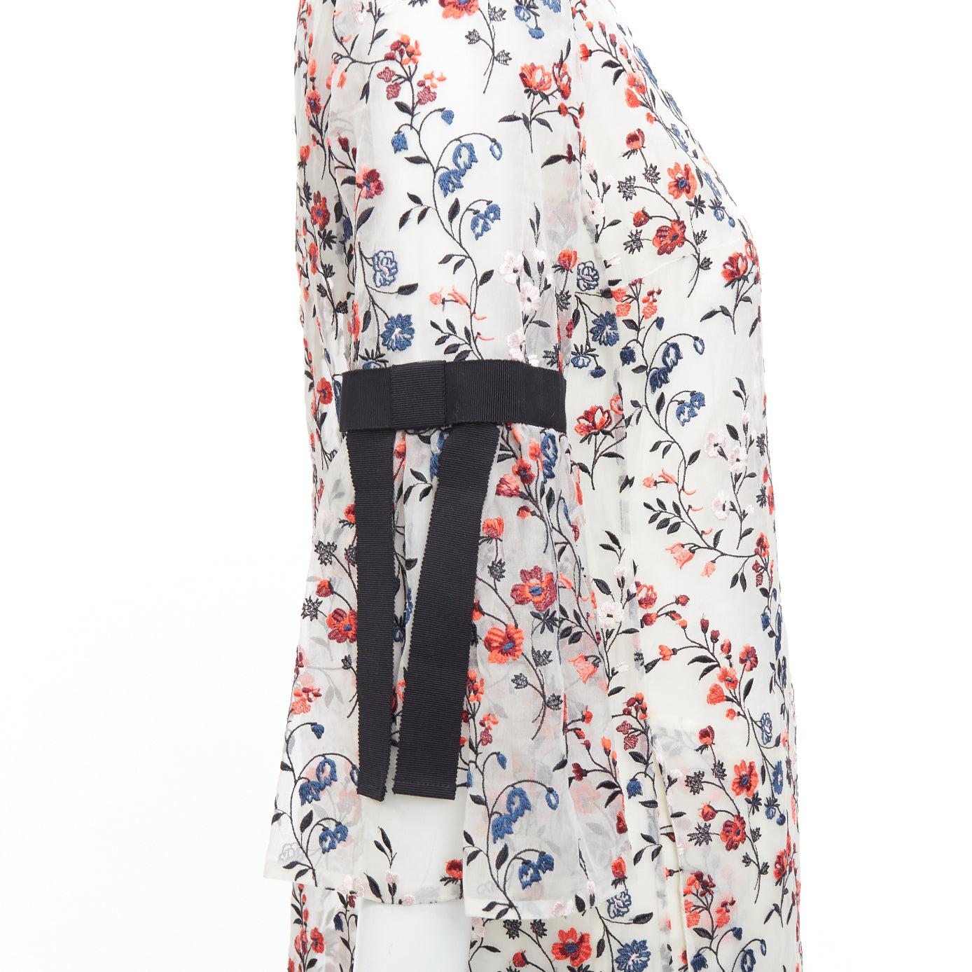 ERDEM Lissy 100% silk white red floral embroidered pleated dress UK8 S
Reference: MECG/A00046
Brand: Erdem
Model: Lissy
Material: Silk
Color: White, Red
Pattern: Floral
Closure: Zip
Lining: Cream Silk
Extra Details: Black trims at arms.
Made in: