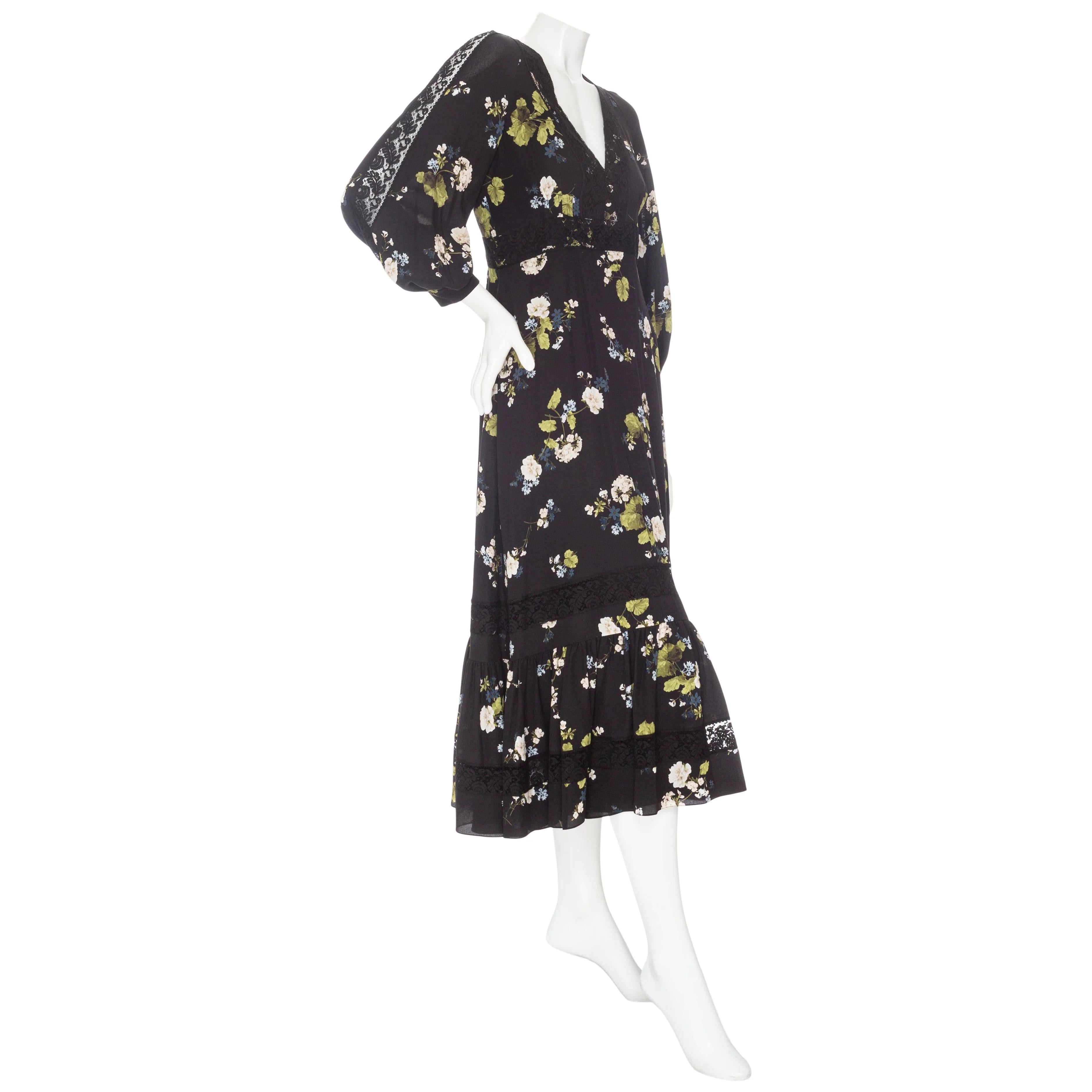 Erdem Magdalene Black Silk Floral-Print Long Sleeve Midi Dress 

Pre-Fall 2022 Ready-to-Wear
Black
Floral print
Lace trim
3/4 lantern sleeves with button fastening at cuffs
V-neckline
Fitted waist
Tiered ruffled skirt
Concealed back zip
