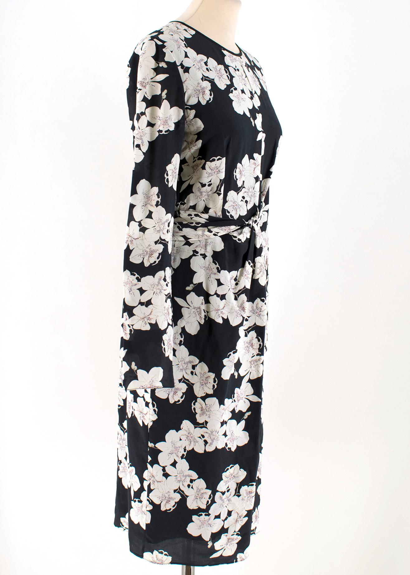 Erdem Navy Blue and White Flower Print Midi Dress

- material- 100% silk
- round neckline 
- long-sleeved
- mid-length
- mini keyhole cut out detail at the front
- back zip fastening
- gathered twist front detail

Please note, these items are