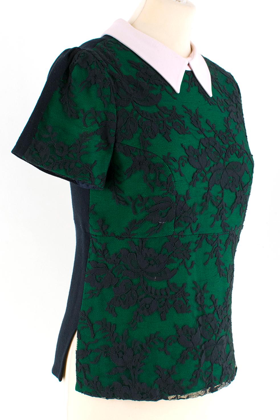 Erdem Navy & Green Wool Embroidered Top W/ Baby Pink Collar

- navy & green wool top
- nave lace embellishment to the front 
- baby pink collar
- short sleeve
- contrasting metallic zip closure to the back

Please note, these items are pre-owned and