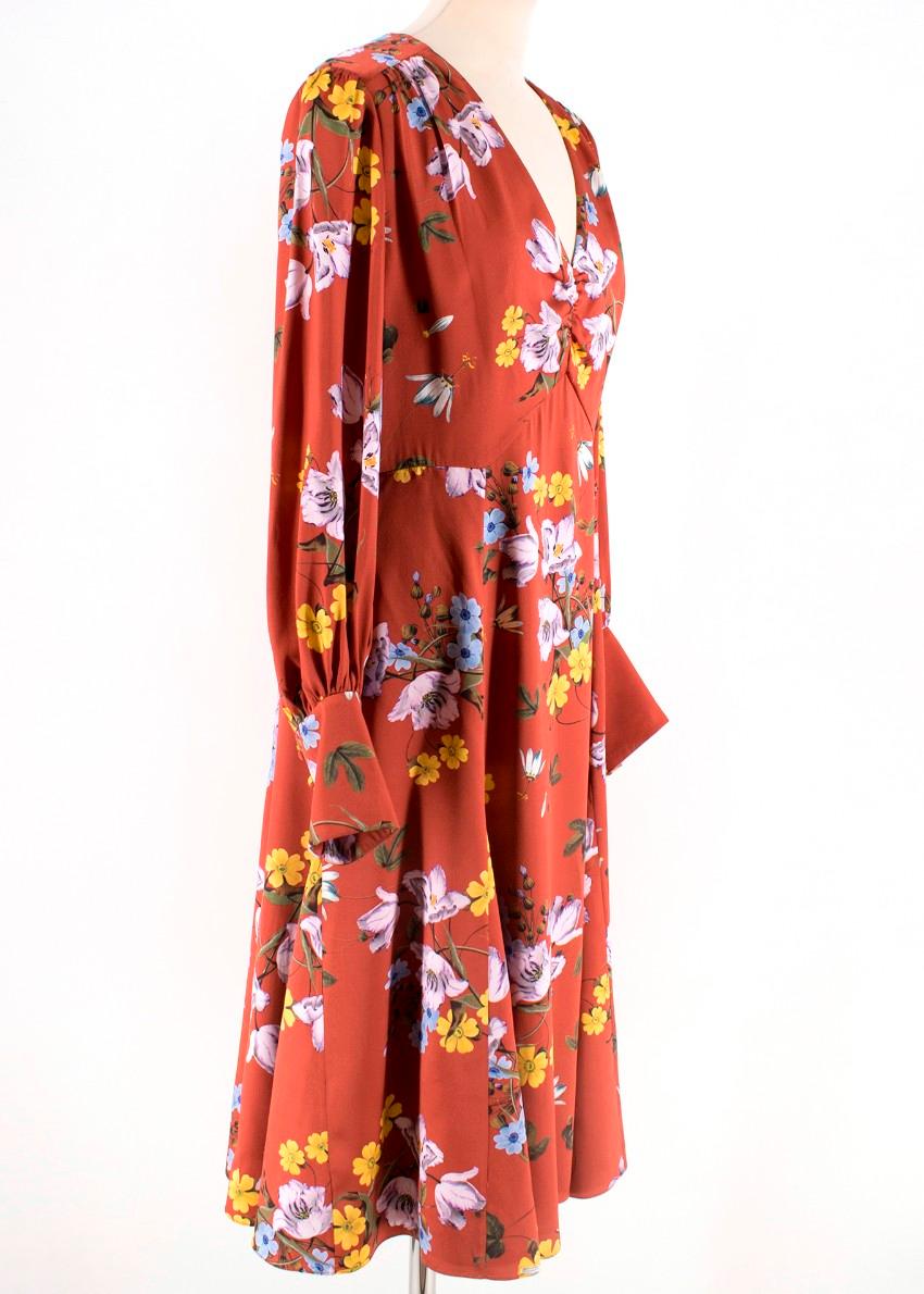 Erdem Osiris printed silk dress. Graceful design crafted from silk satin in a red hue and adorned with a floral pattern. Featuring a v shape neckline and a back zipper fastening. Fully lined. Professional dry clean only. RRP £1500

Please note,