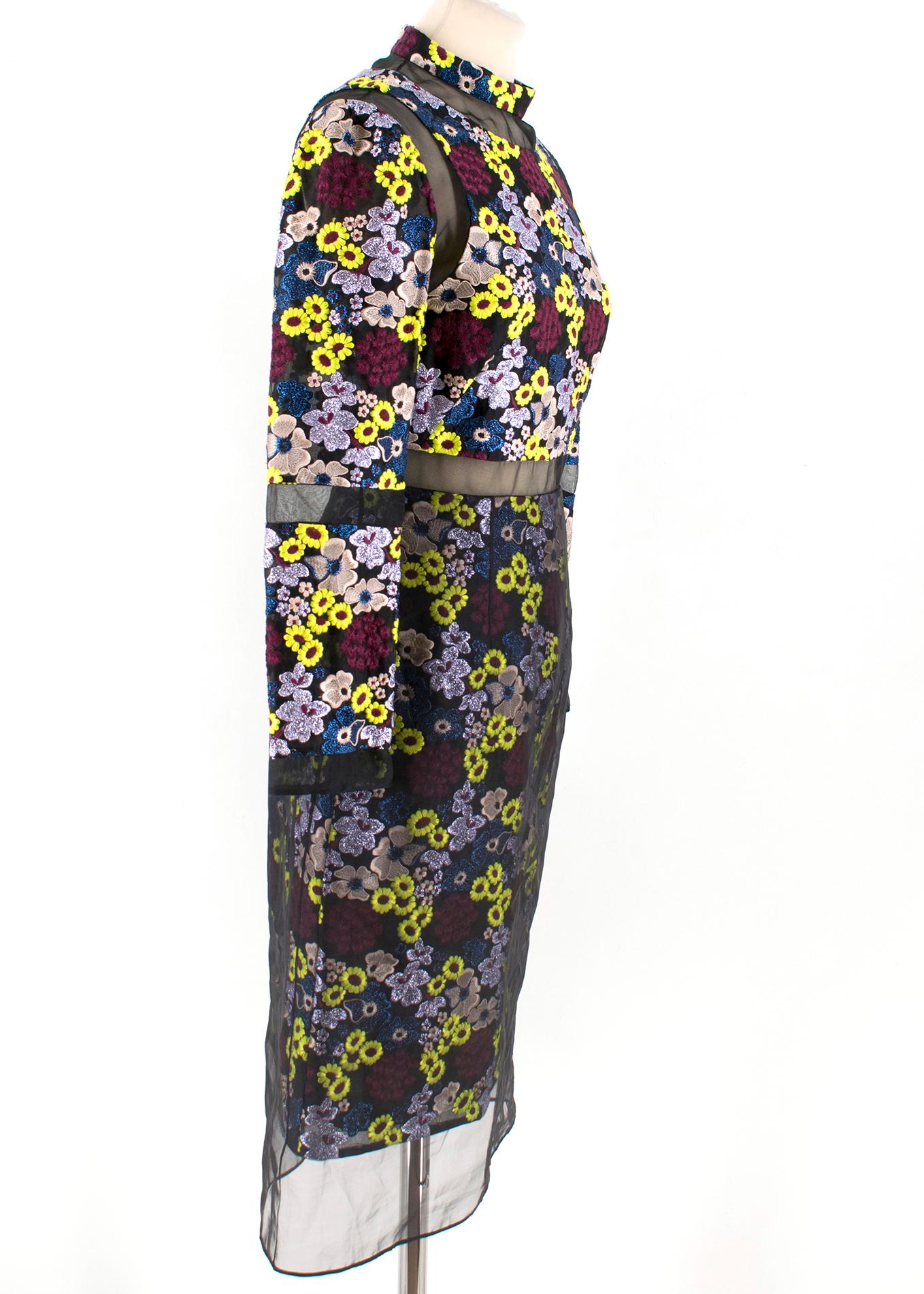 This Erdem dress comes in a beautiful contrast between black organza with see-through parts and bright purple/yellow/burgundy flowers. RRP £1370

- Long sleeves 
- Hidden zip closure 
- Made in England
- Outer: 32% Polyester, 21% Silk, 18% Cotton,