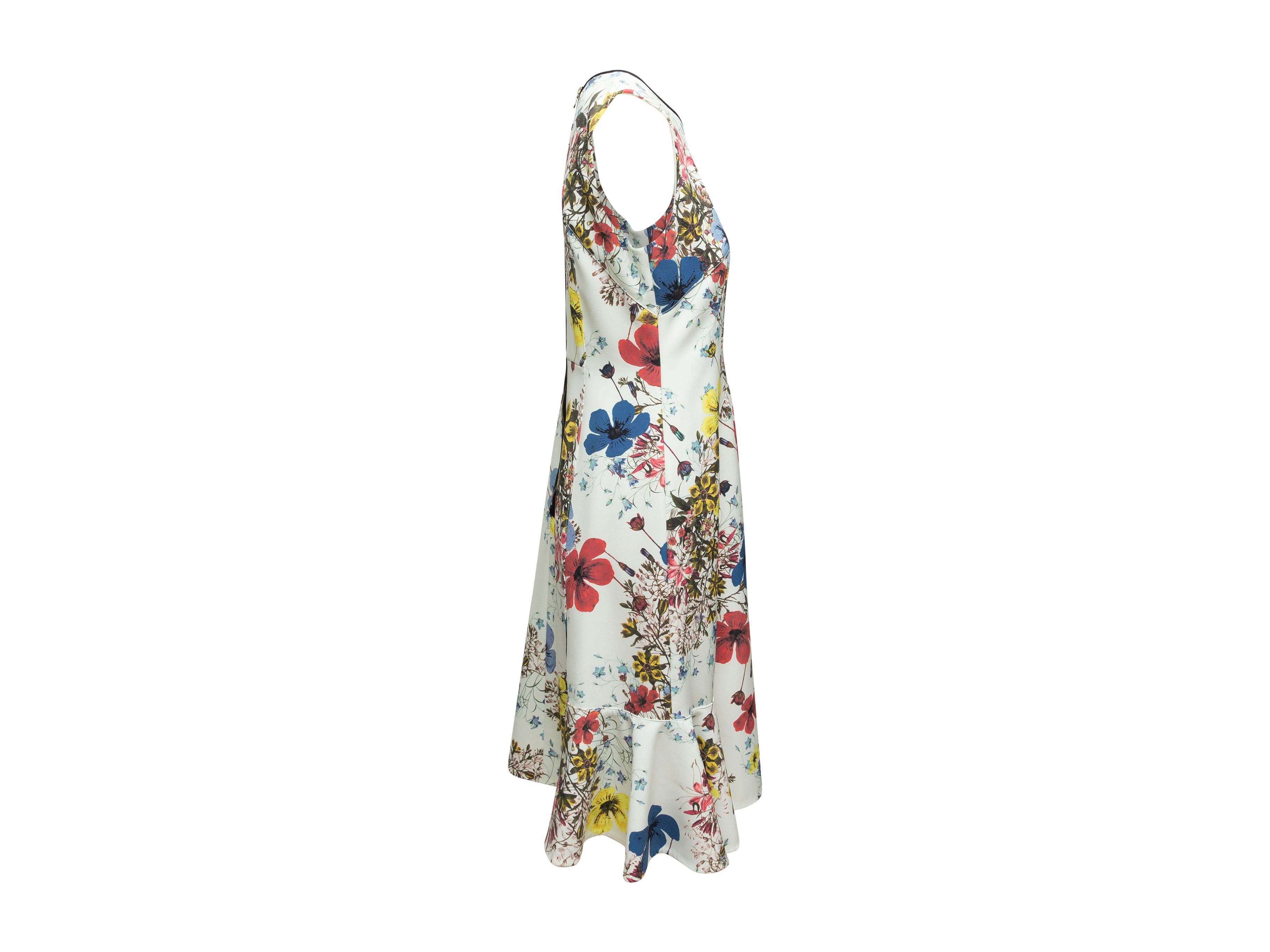 Product details: White and multicolor 'Jana' sleeveless dress by Erdem. Floral print throughout. Crew neck. Zip closure at back. 36