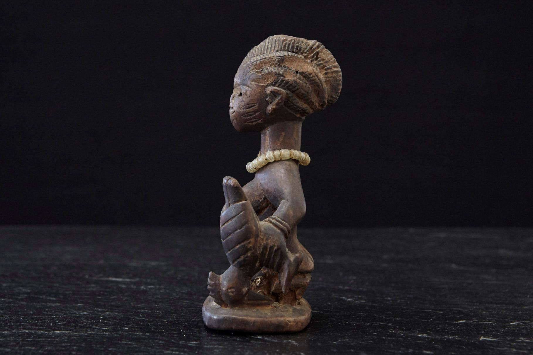 Nigerian Ere Ibeji Female Commemorative Figure, Yoruba People, Nigeria, early 20th C For Sale