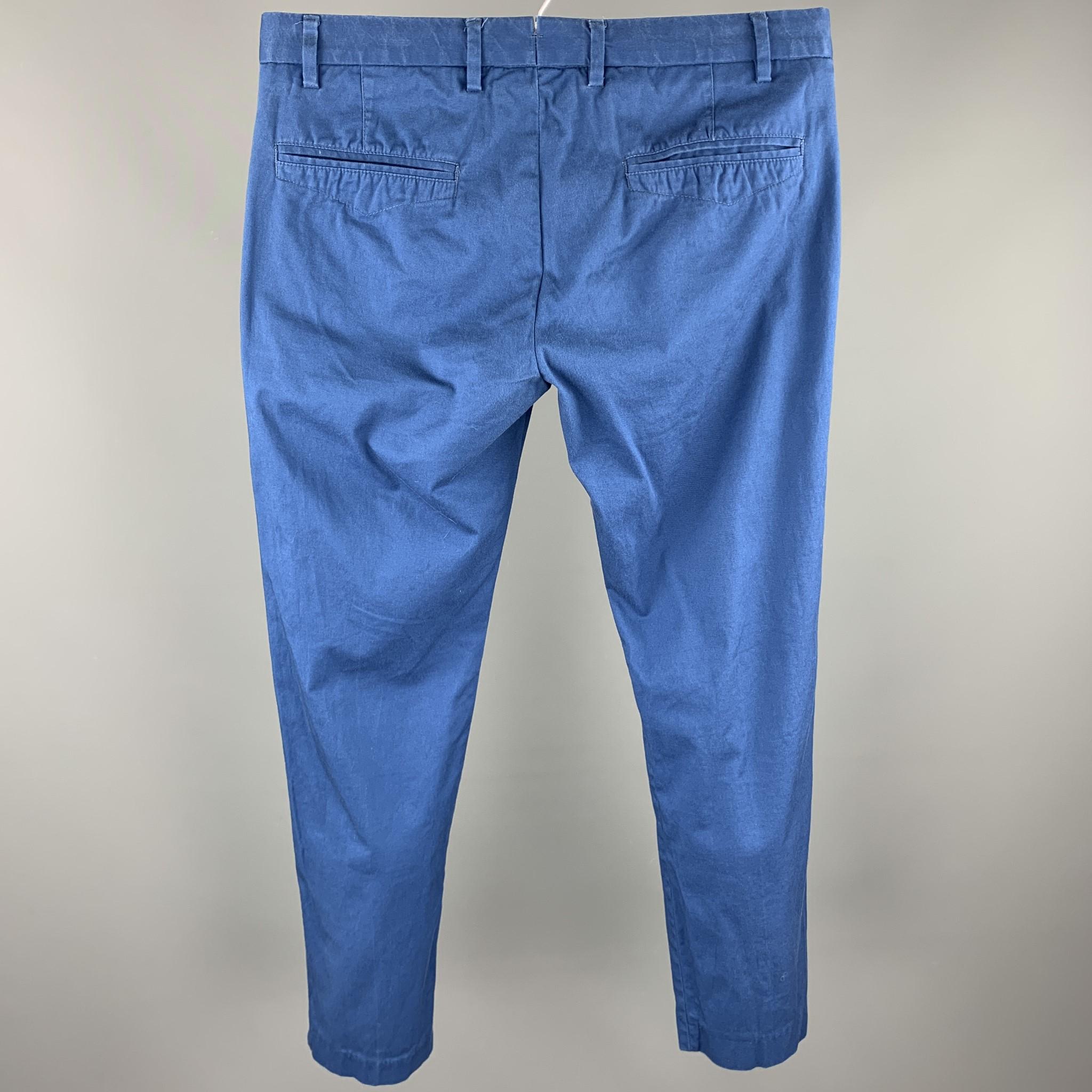 EREDI PISANO casual pants comes in a blue cotton / elastane featuring a slim fit and a zip fly closure.
 

Very Good Pre-Owned Condition.
Marked: 46

Measurements:

Waist: 32 in. 
Rise: 8 in. 
Inseam: 27 in. 