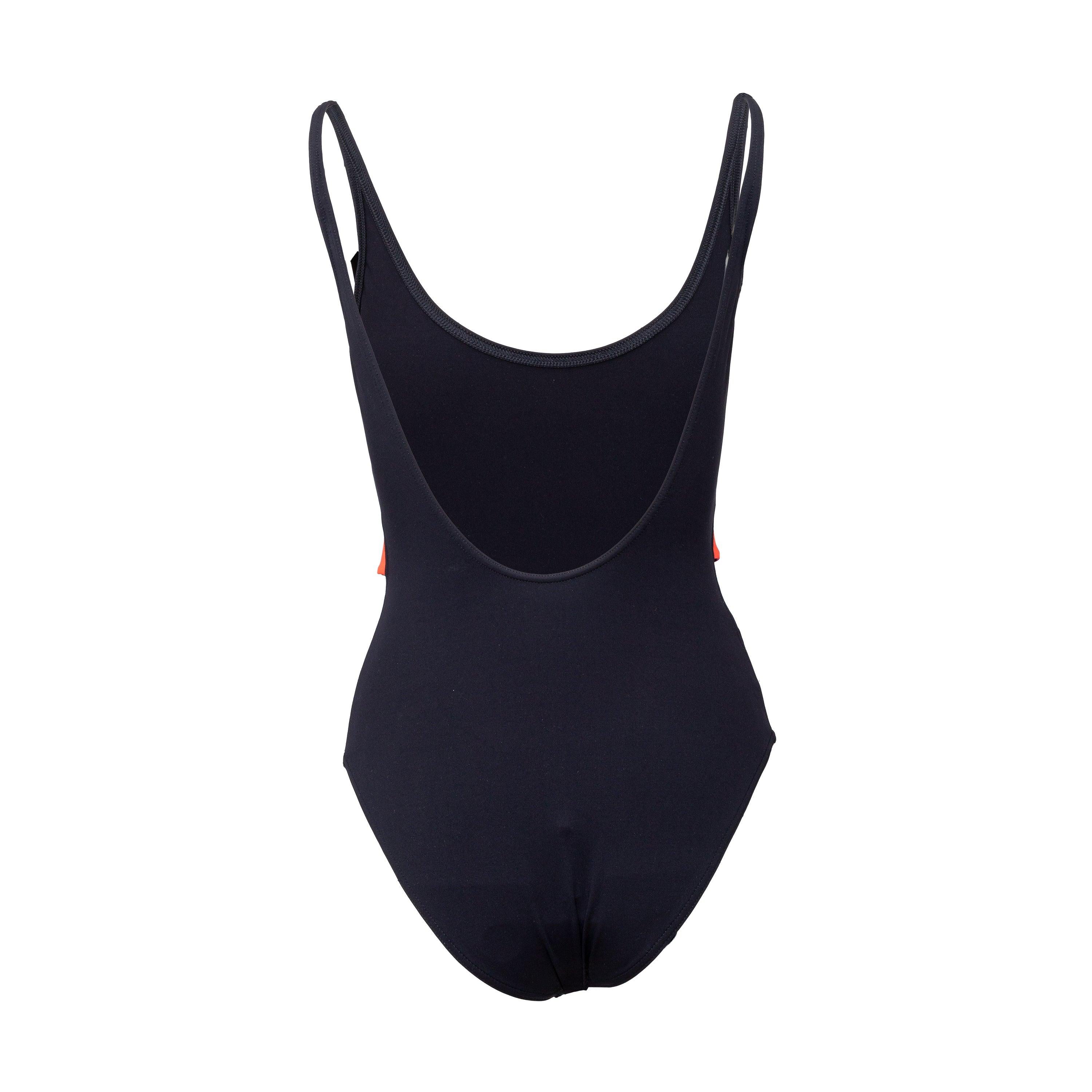 Crafted from Eres' signature skin-effect fabric, the Damier one-piece swimwear boasts delicate spaghetti straps and an elegant scooped back. A unique patchwork tie half-belt adds a figure-flattering touch, while the geometric Kaleido print adds a