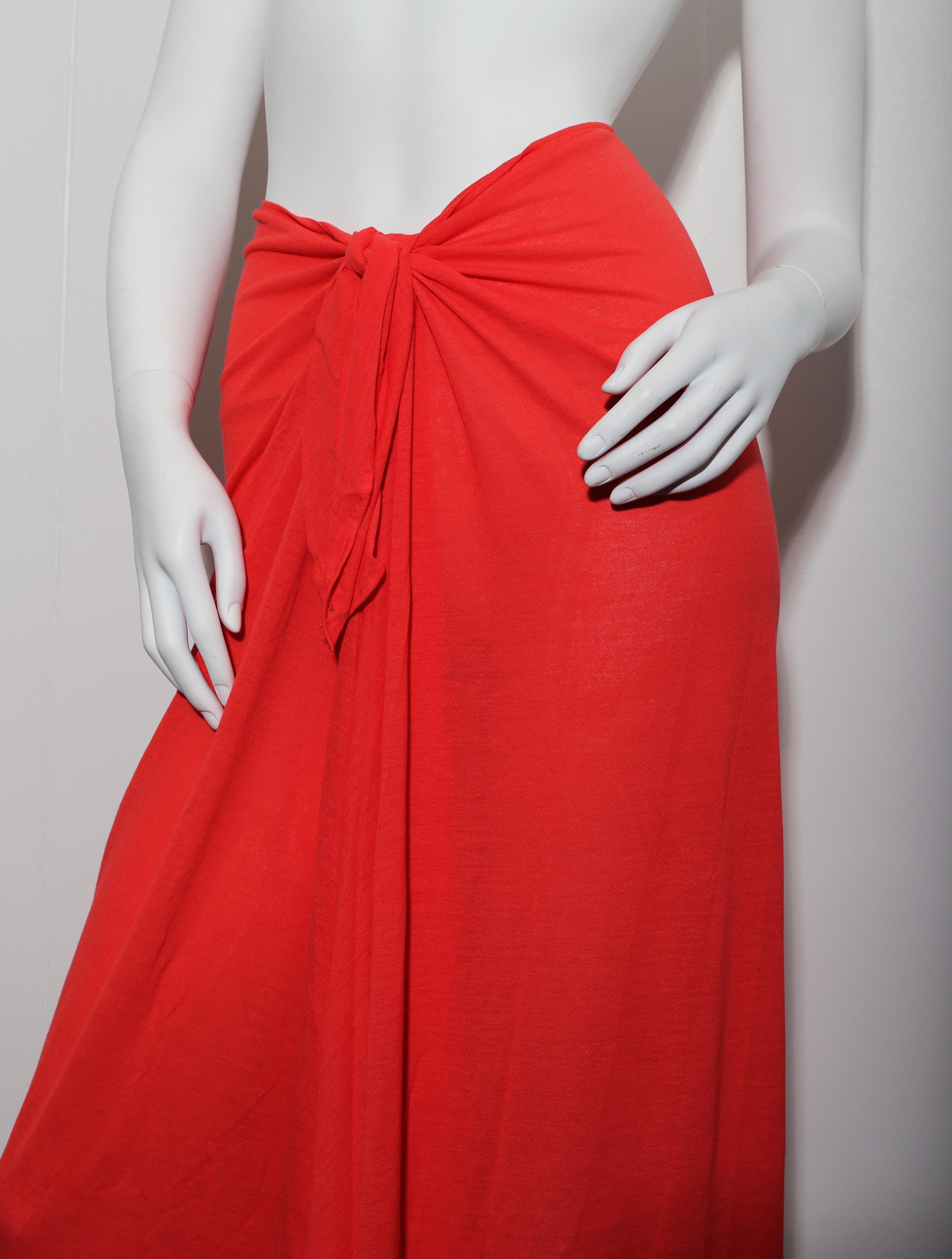 Red  Long  pareo from Eres featuring side tie fastening, straight hem and toe-length. 
Material:   82 % rayon, 18% poliamide 
Size  France 1 US Medium 

Orders welcome!!  all goods are insured and we package all purchases to a high standard.

Our
