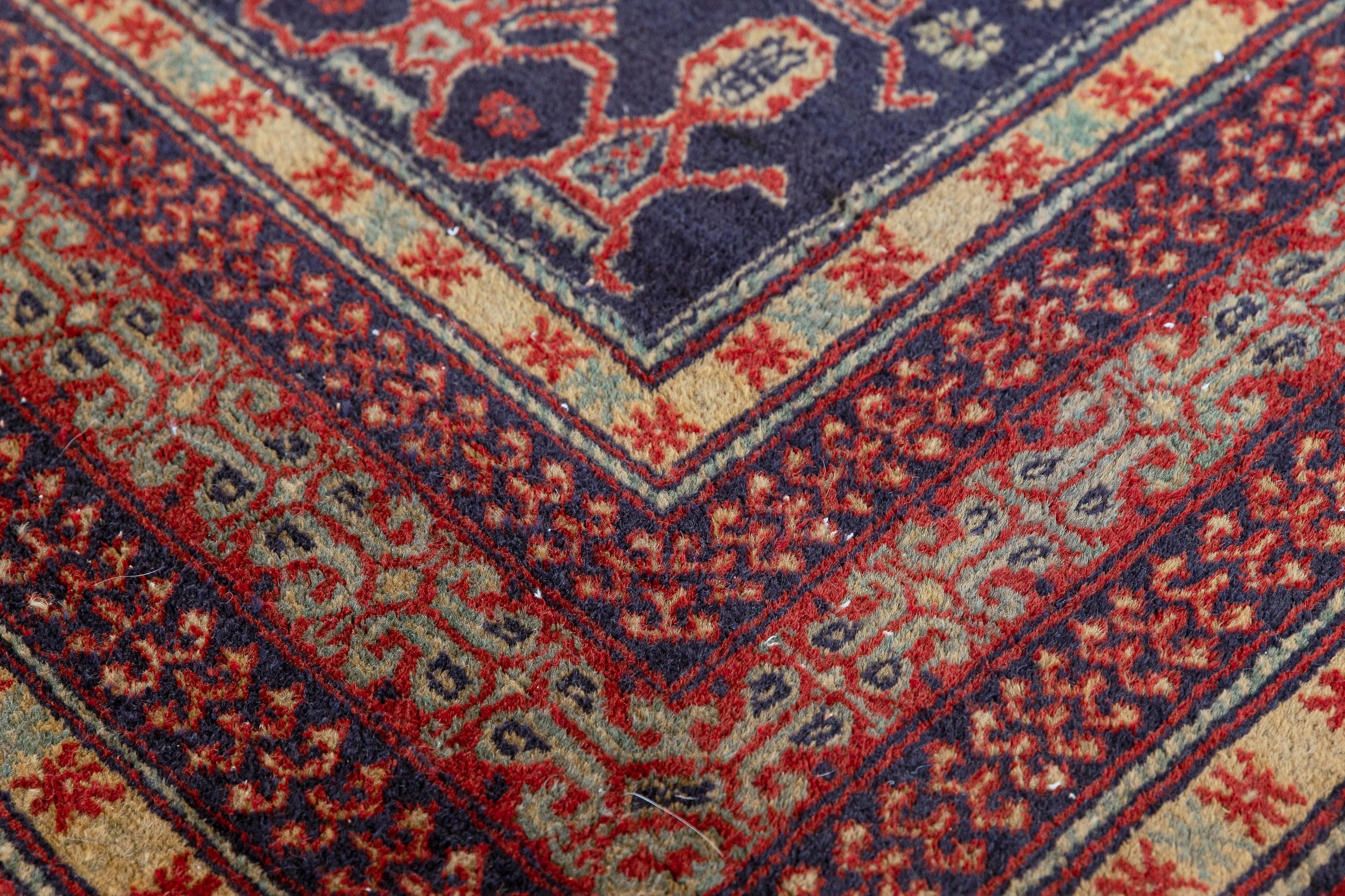 Yerevan – Souther Central Caucasian
This Yerevan rug shares the Gabistan design of the Shirvan rugs from Maraza, Azerbaijan. Human figures are depicted performing the jally dance at both ends of the rug. The navy-blue field of the carpet hosts four