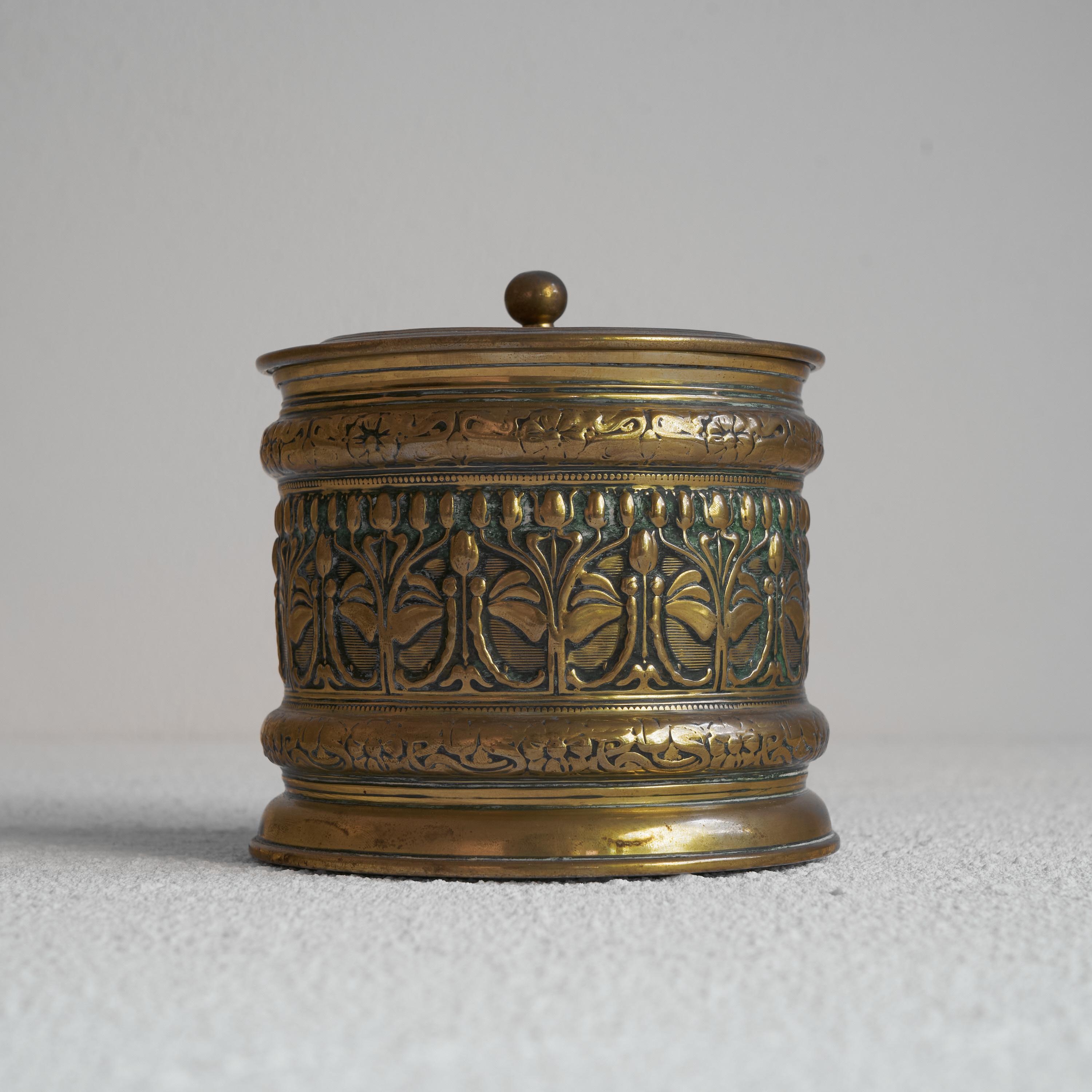 Erhard & Söhne Art Nouveau lidded pot in patinated brass. Germany, early 20th century.

Beautiful art nouveau lidded pot made by Erhard & Söhne in Germany somewhere in the first two decades of the 20th century. Elegant and stylish floral decor and