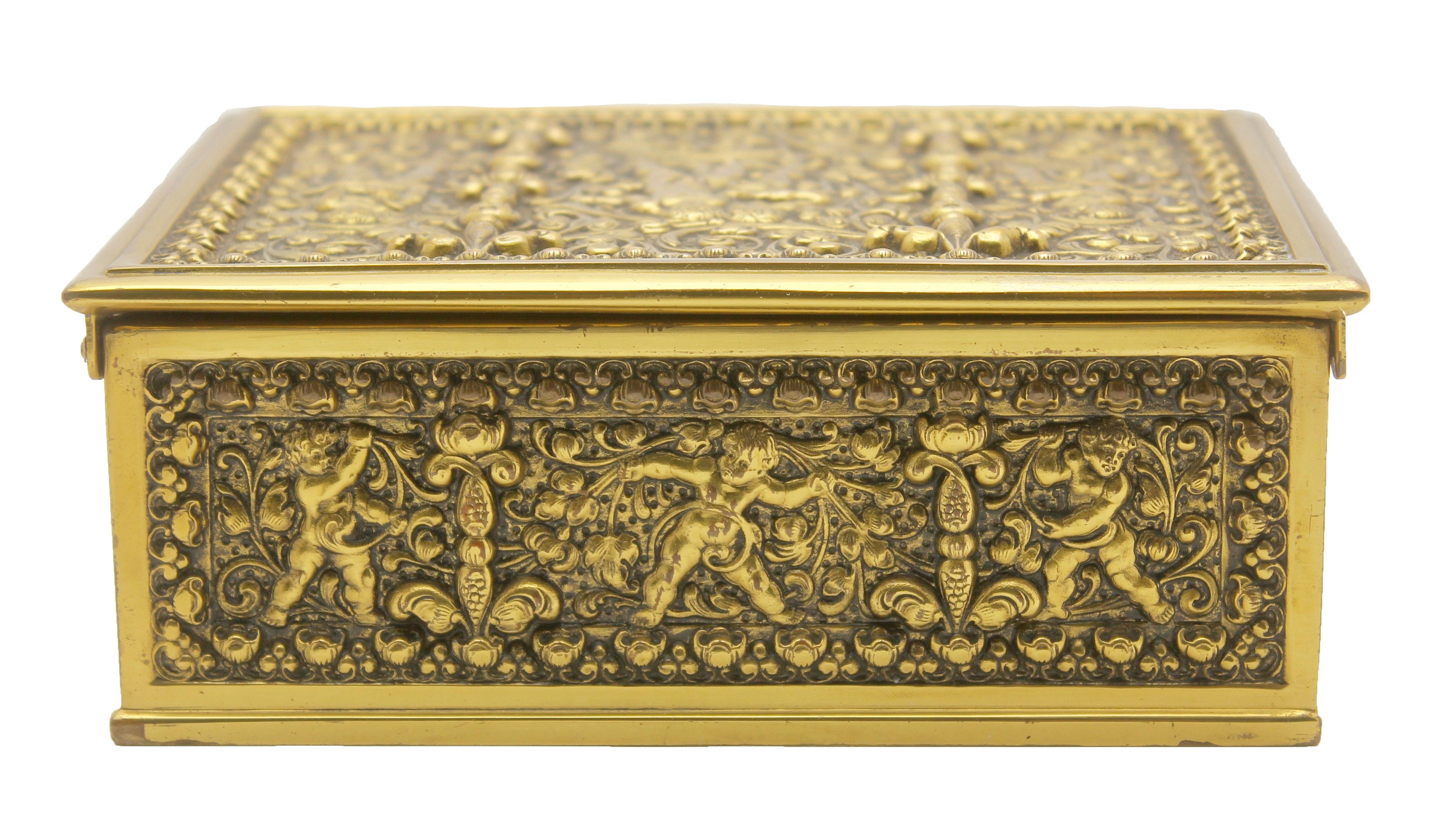 Erhard & Sons Art Nouveau brass repousse tobacco or jewelry box signed

The top, front, sides and back are beautifully cast in gilt brass and feature panels
with image of angels.
The inner side is covered with cedar wood.
Nice original patina.
