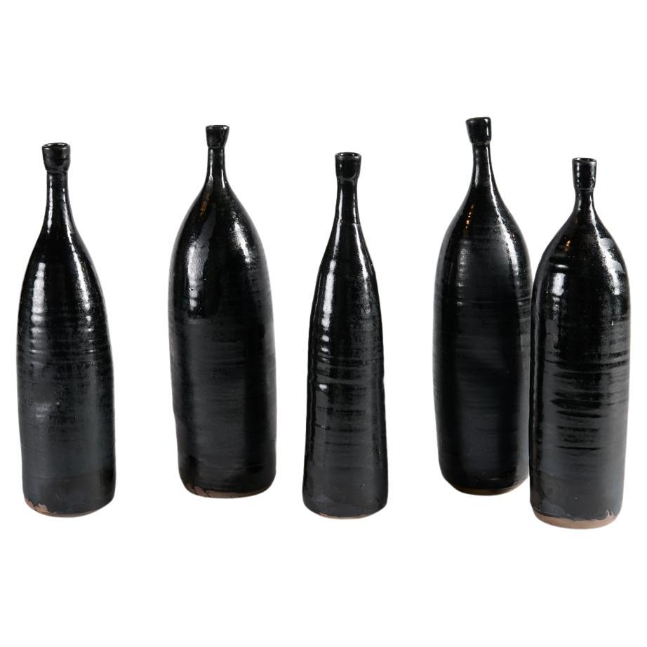 Eric Astoul, Groupe de vases en céramique, glaçure noire, La Borne, France, 2025