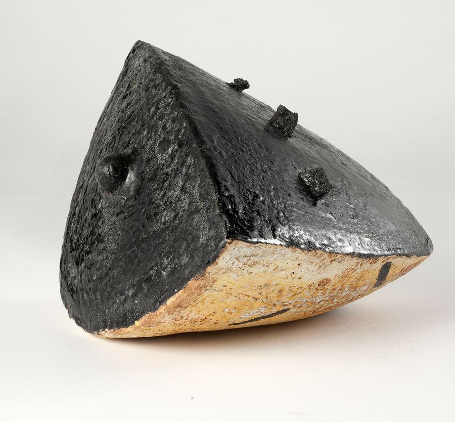 Unique piece
Signed: Astoul.

Master ceramicist Eric Astoul created this piece as part of a series inspired by both modern and ancient stoneware, which, with its rough firing, flips the traditional ceramic craft known to La Borne on its head.