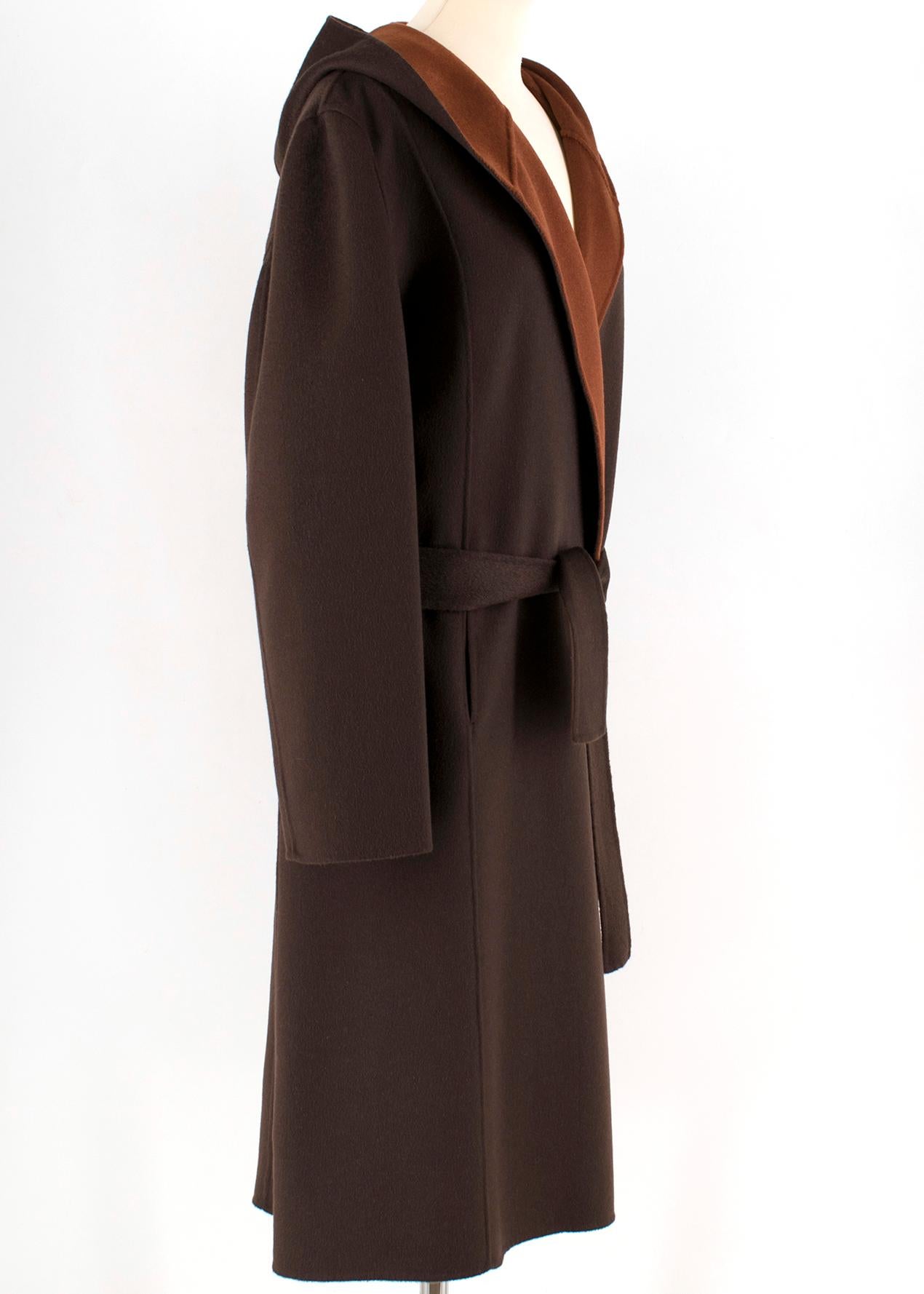 Eric Bompard Brown Cashmere Coat

- cashmere brown coat 
- unlined
- belt fastening 
- hood
- slip pockets 

Please note, these items are pre-owned and may show some signs of storage, even when unworn and unused. This is reflected within the