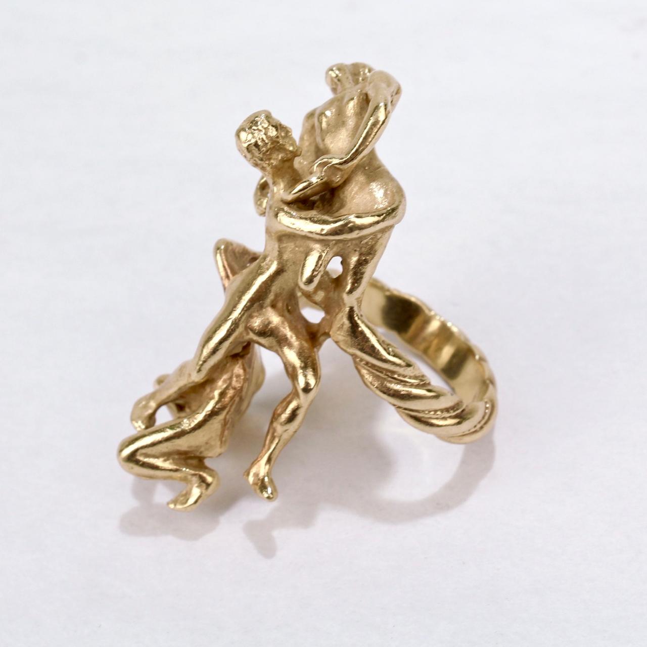 A wonderful Eric de Kolb 14-karat yellow gold ring depicting the Rape of the Sabine Women.

Eric de Kolb was a renowned New York City sculptor and jewelry maker working in the second half of the 20th Century. He was born to an Austrian family of