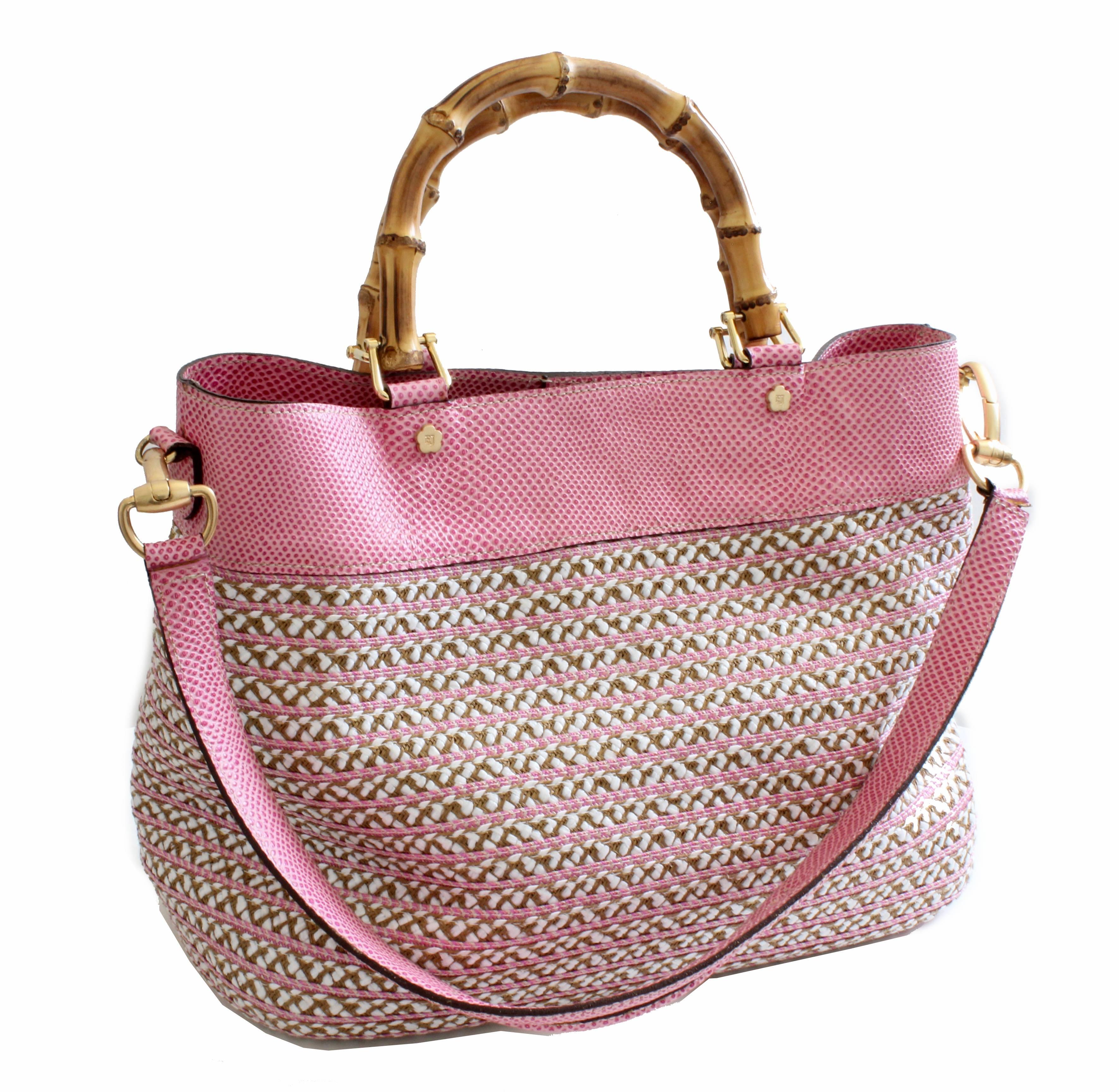 This fabulous bag is from Eric Javits New York.  Called the Analu Squishee Tote, this version features a pink and white weave, with pink lizard stamped leather trim.  In very good preowned condition with minimal signs of prior wear.  Dimensions: