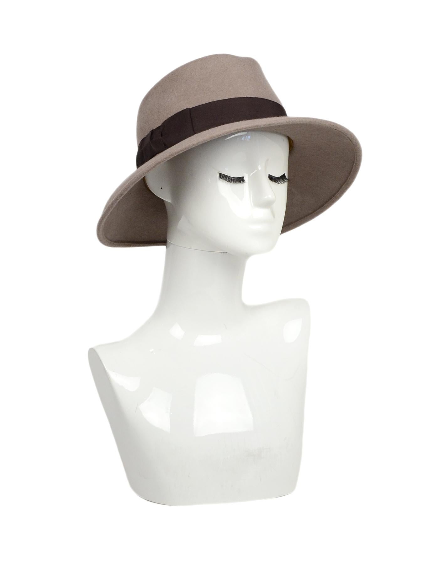 Eric Javits Taupe Hat W/ Brown Ribbon Bow Trim 

Made In: USA
Color: Taupe, brown
Materials: Felt
Closure/Opening: Pull on
Overall Condition: Excellent pre-owned condition 

Measurements:
12.5