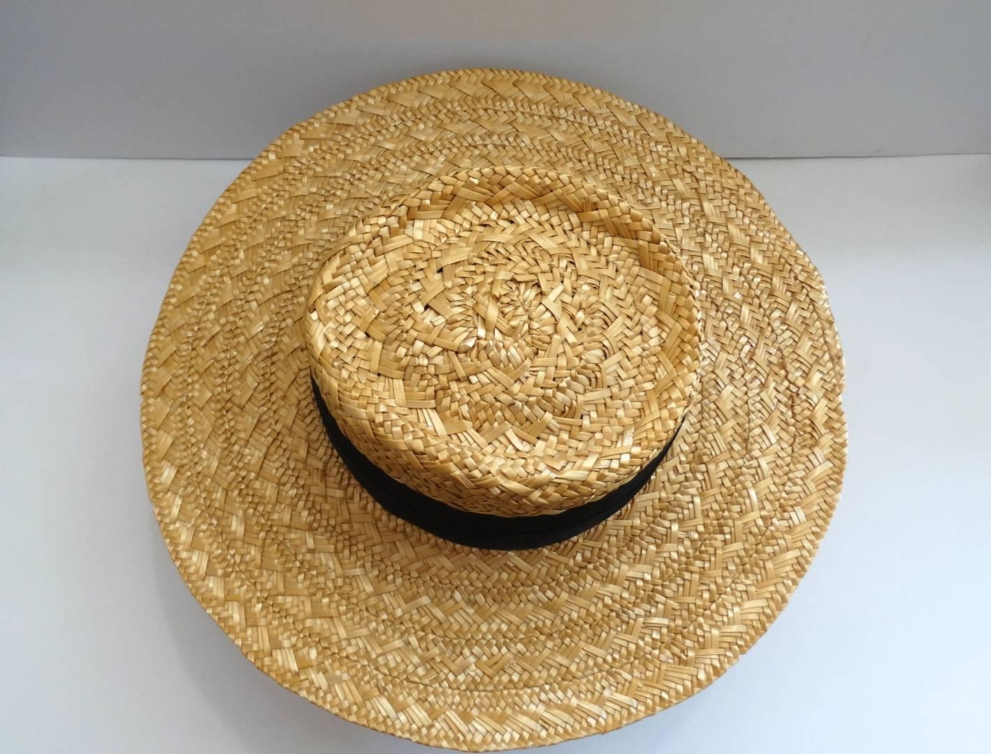 This piece is so classic you'll be reaching for it all summer long- this Eric Javits straw hat is the perfect staple for your cruise wardrobe! Pairs perfectly with a headscarf tied underneath, or on it's own with your favorite cover-up. Made of a