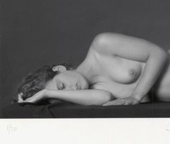 Lying Nude (Long-legged full frontal female nude lying prone on her right side)