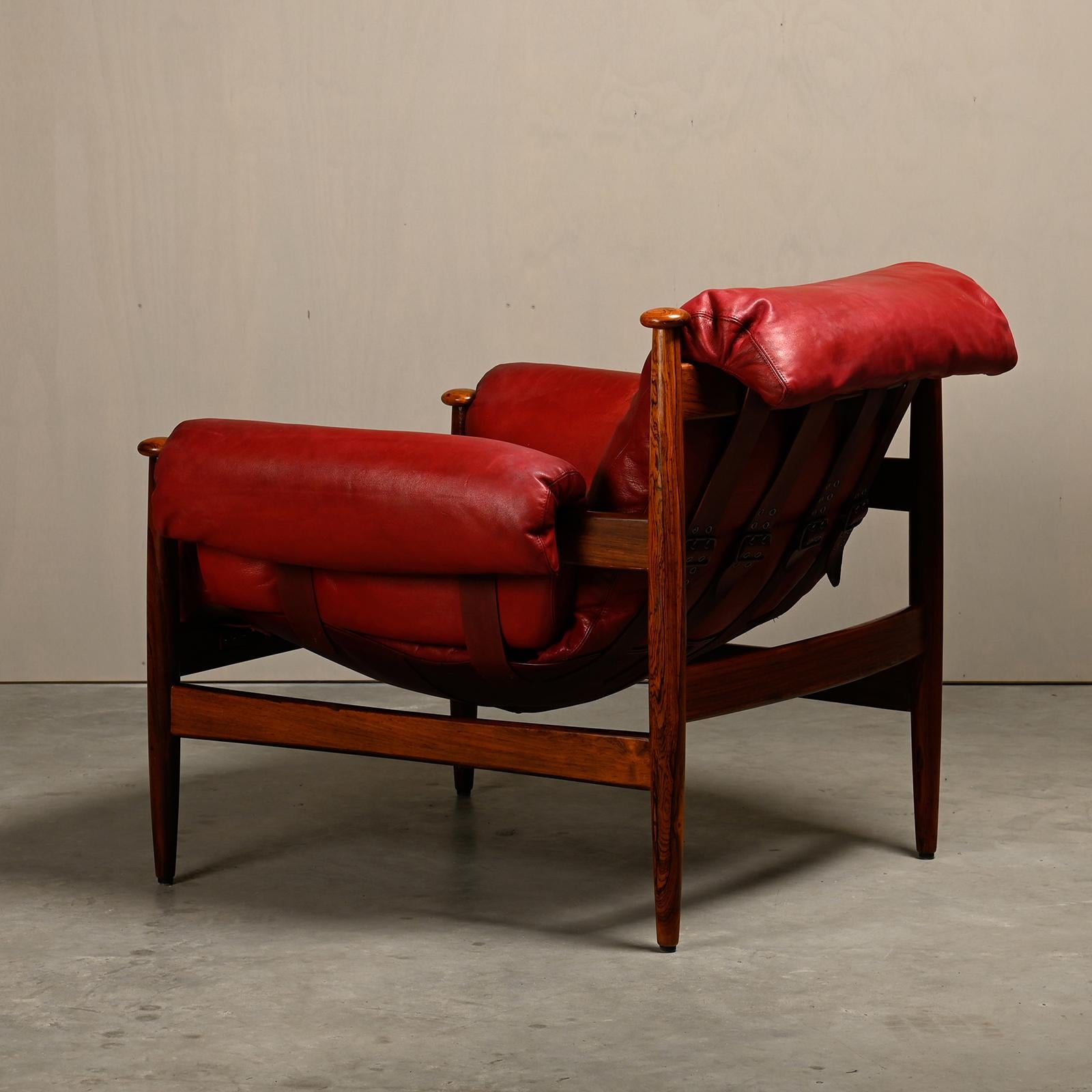 Leather Eric Merthen Amiral Lounge Chair in dark wood and red leather for IRE Möbler For Sale