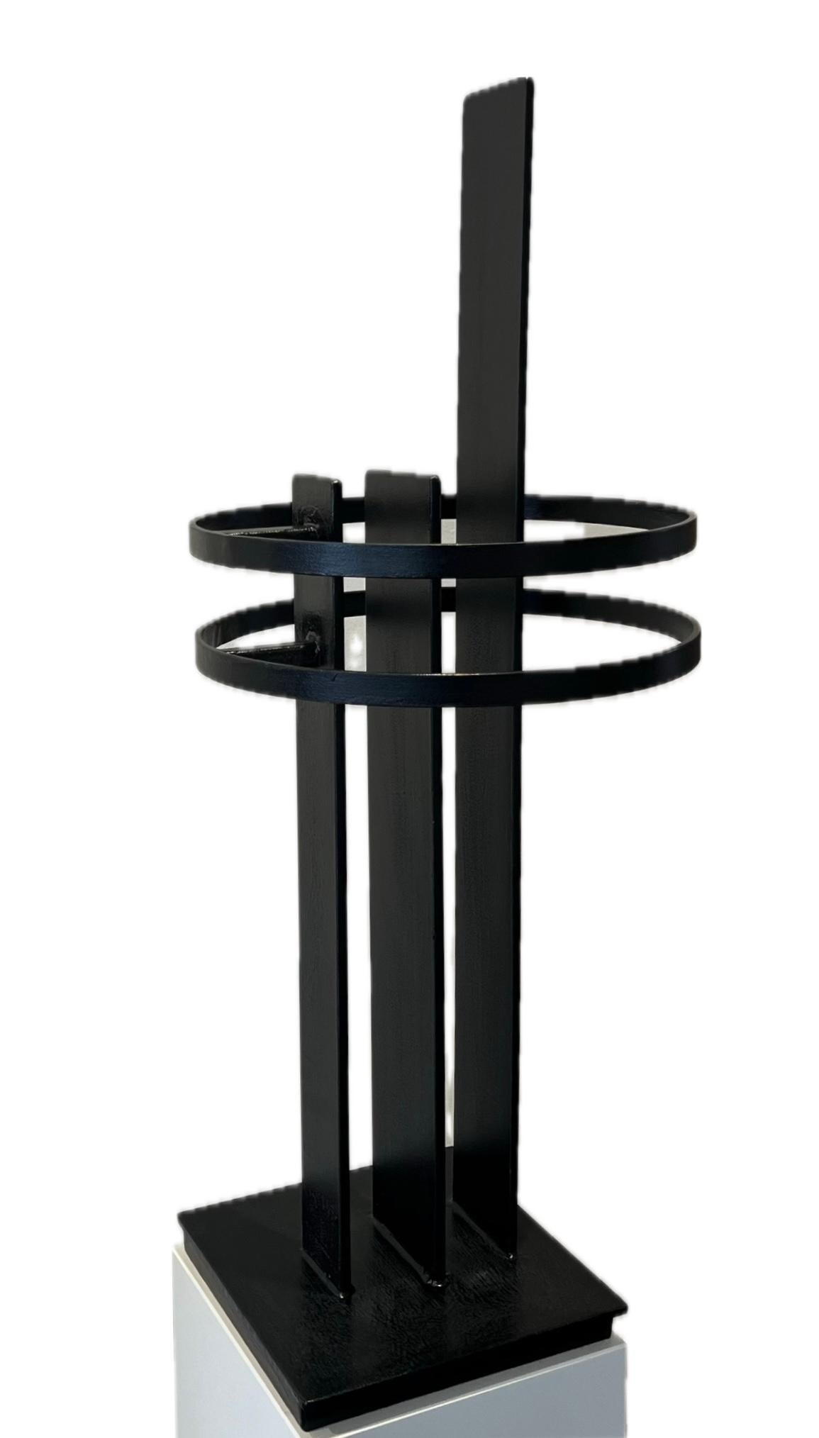 Symbiose Small Black Steel Sculpture Symbolic Abstract Geometric Art In Stock
Eric Morren (22-4-1970, De Bilt) GEOMETRIC SCULPTURES

To explain what art is about then you immediately fall short at the very first sentence. That's the same as that boy