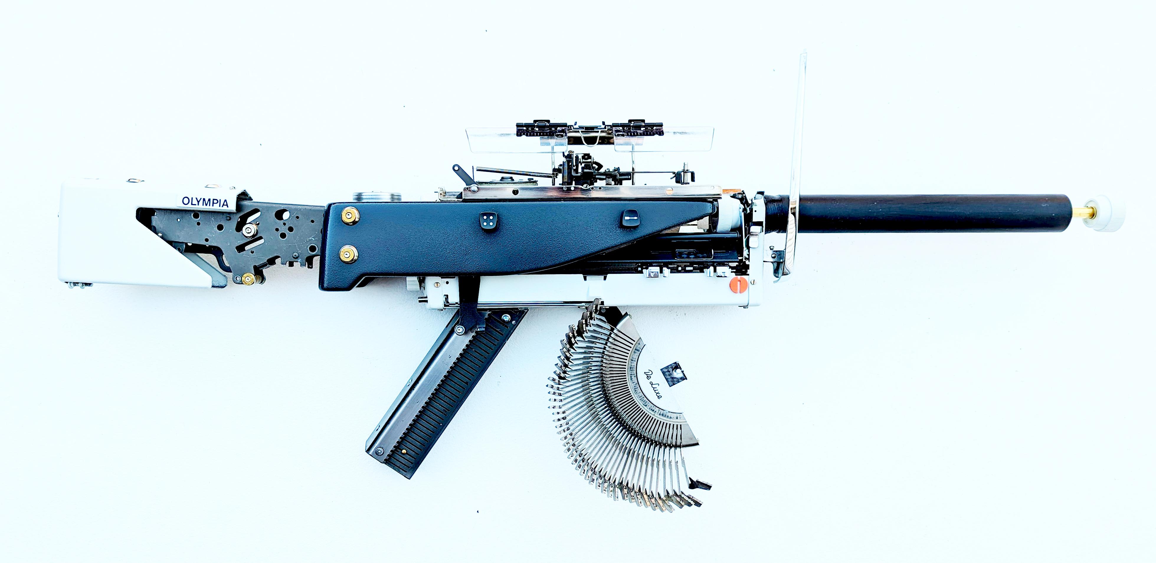 Éric Nado - Olympia, Vintage Typewriter Machine Gun, conceptual and ...