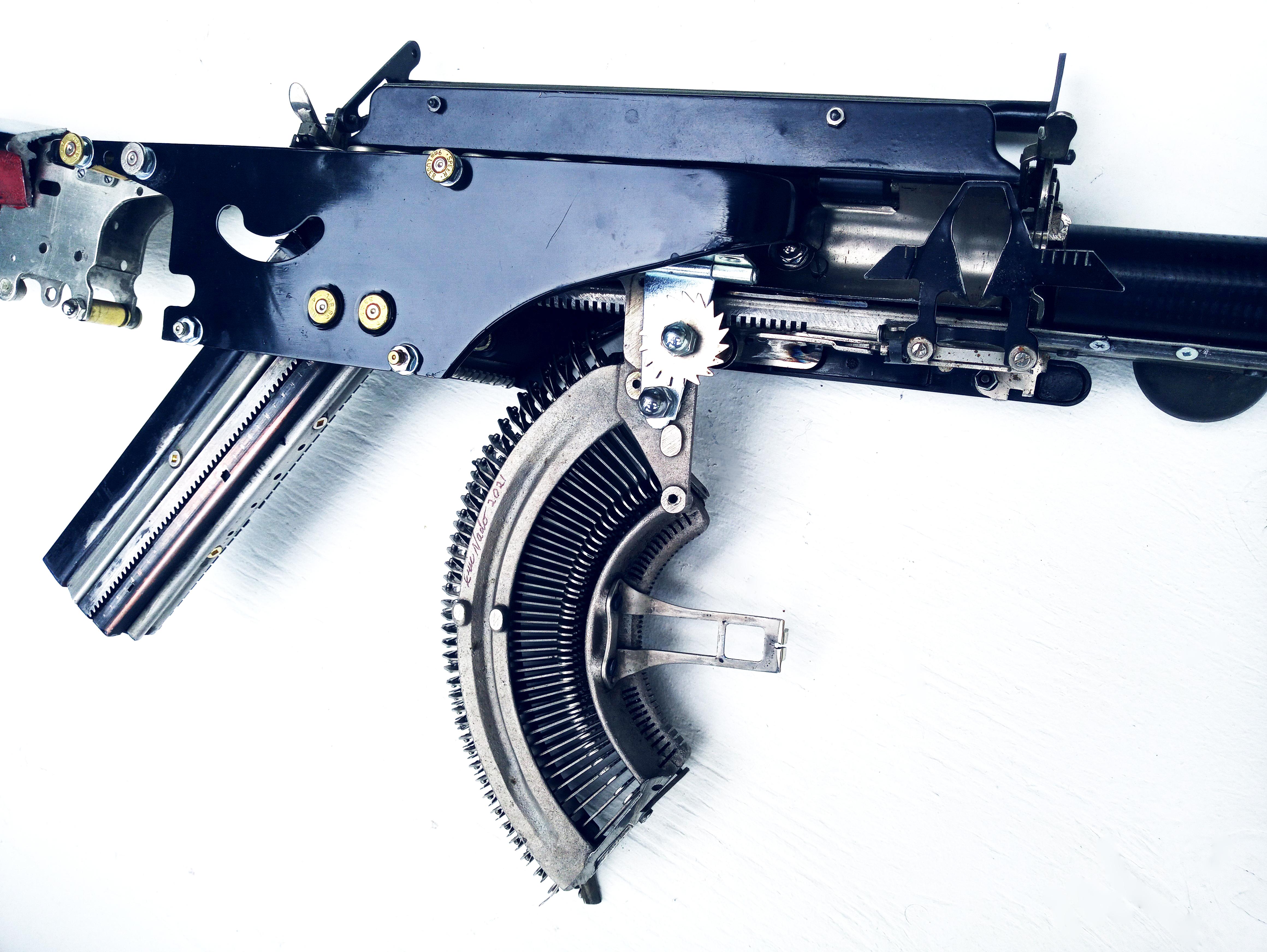 Remington-Trilogy I - black, Vintage Typewriter Machine Gun, wall sculpture  - Sculpture by Éric Nado