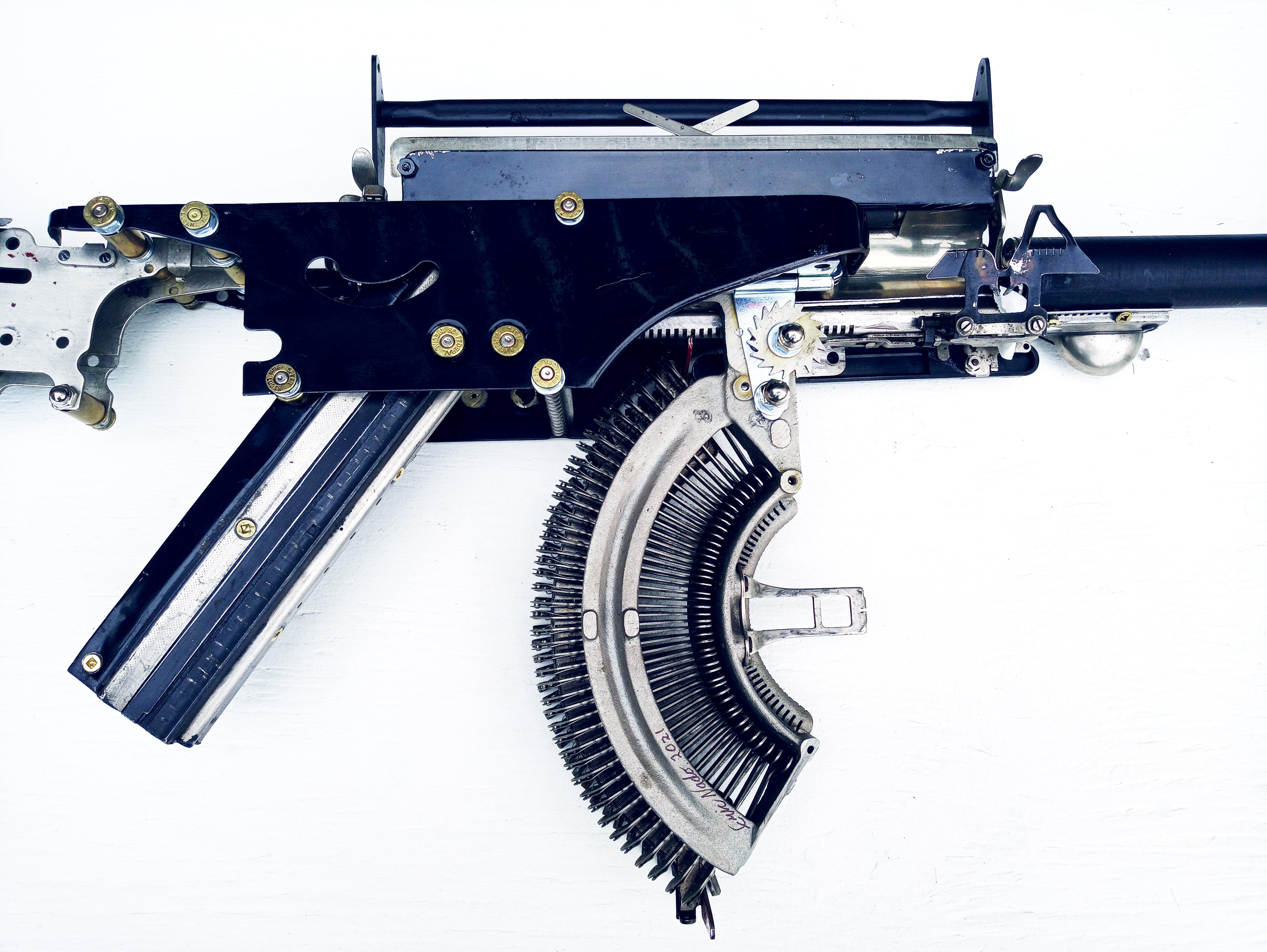 Remington-Trilogy II - black, Vintage Typewriter Machine Gun, wall sculpture  - Sculpture by Éric Nado