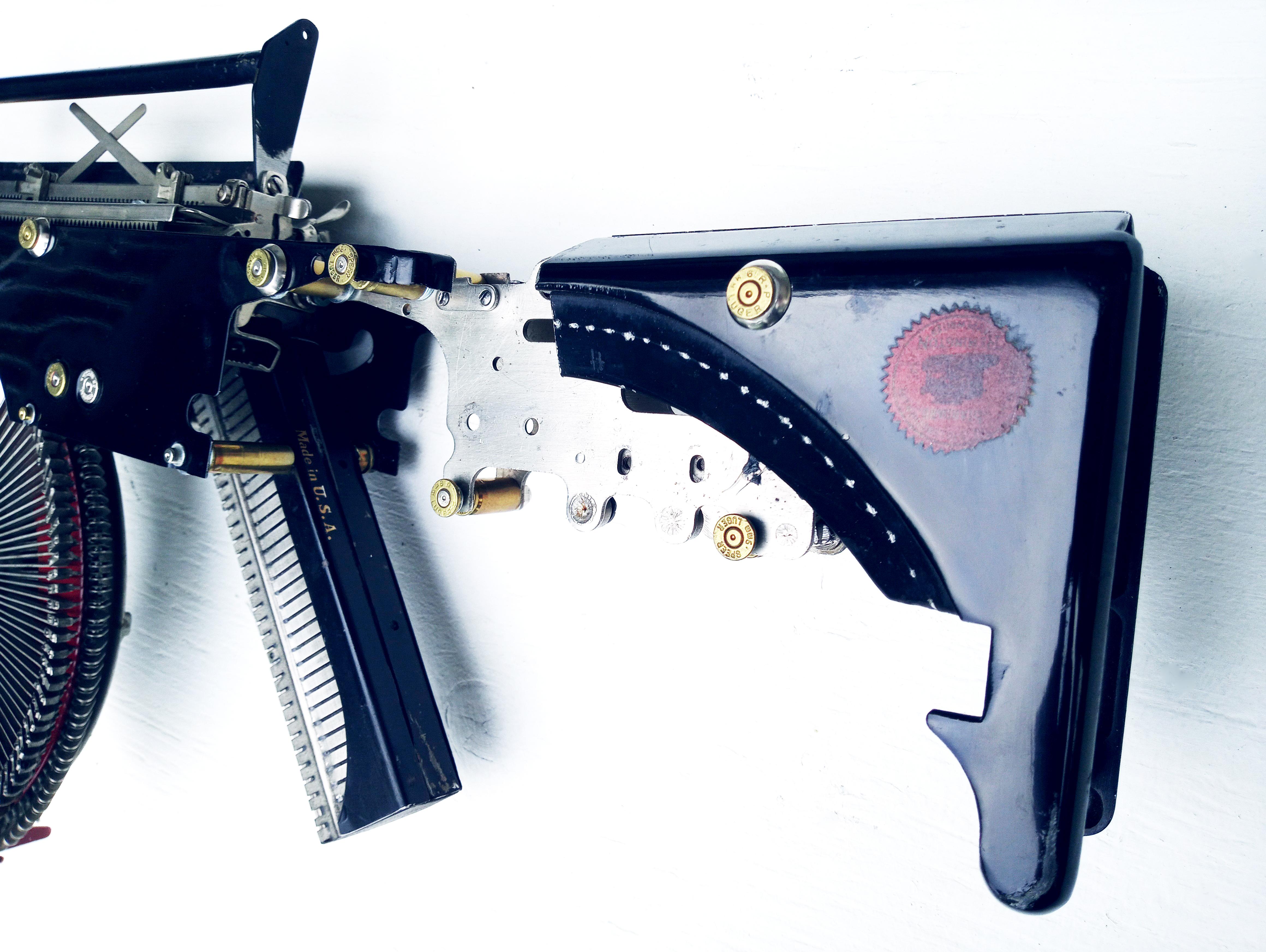 Remington-Trilogy II - black, Vintage Typewriter Machine Gun, wall sculpture  - Contemporary Sculpture by Éric Nado