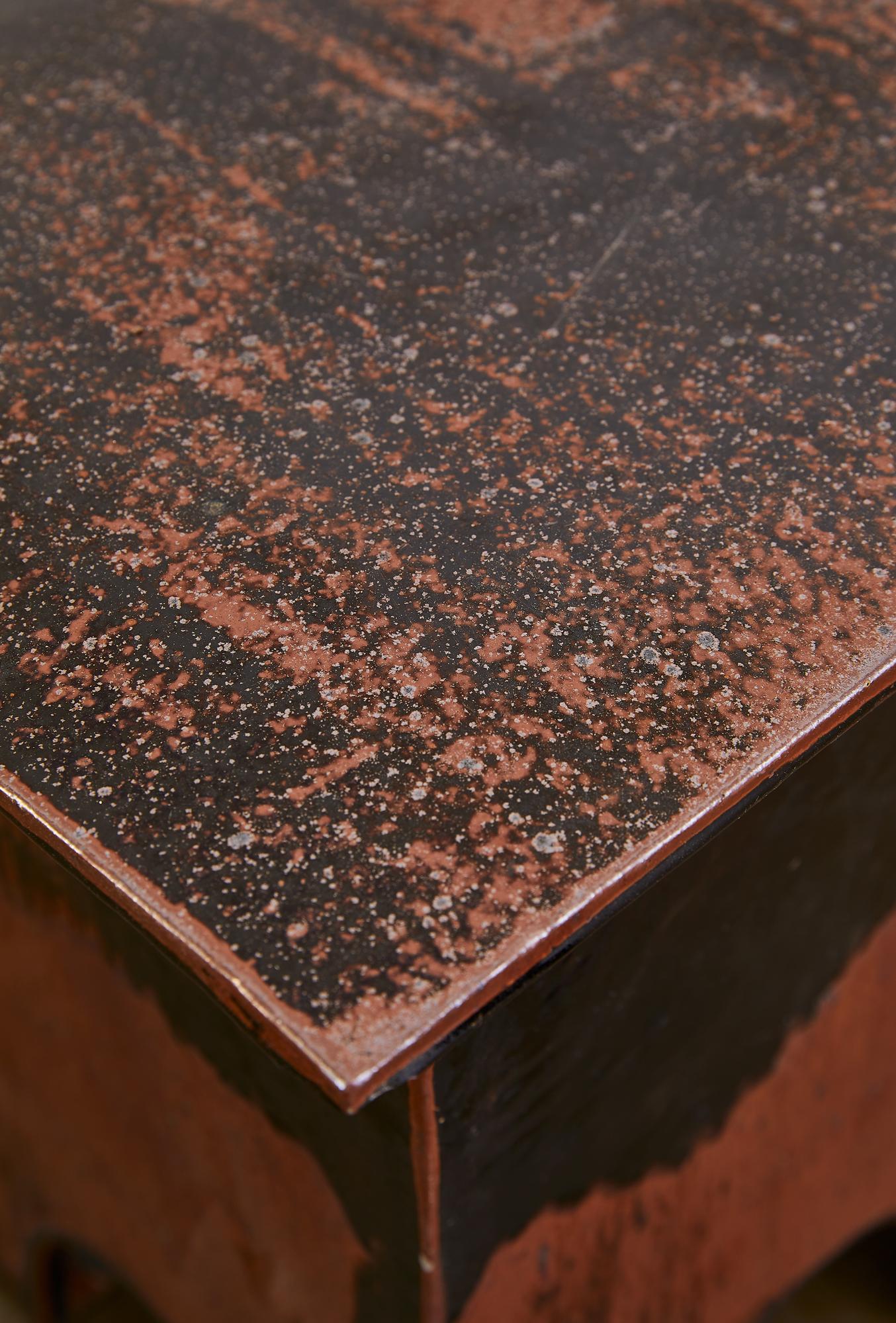 This Postmodern ceramic stool by Eric O’Leary, crafted between 1980-1989, exemplifies his innovative approach to form and glaze. Hand-painted in deep red, rust, and black tones, the piece features an expressive, sculptural surface that highlights