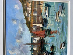 Modern British landscape of Mousehole Regatta harbor with fishing boats