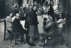Naples - People sitting on the streets, Italy 1950s