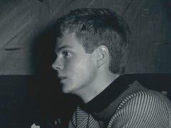 Young student drinking wine, Paris, France 1950s