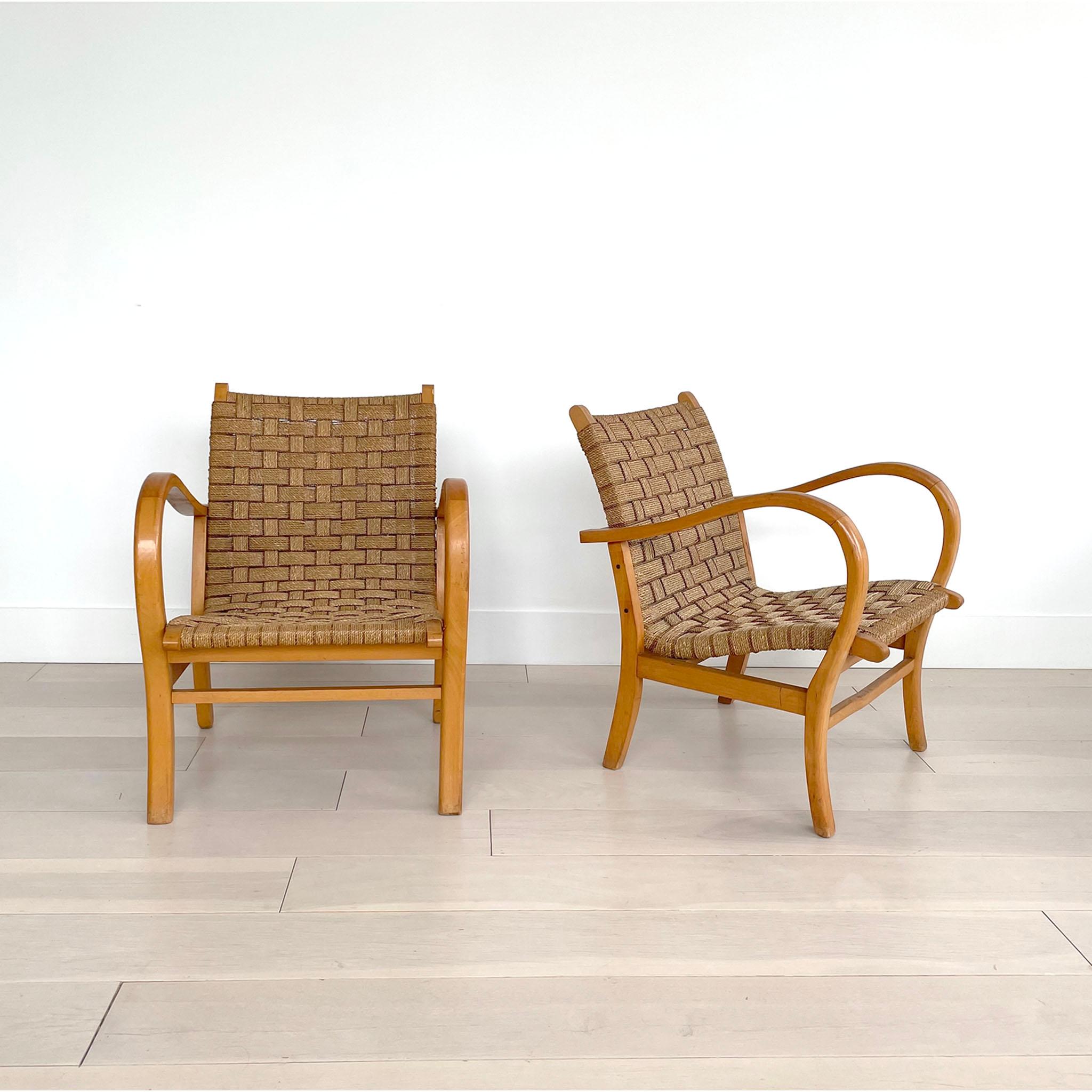 Erich Dieckmann was an influential designer of the Bauhaus movement who was known for curved shapes in his furniture. These chairs have a solid beech wood frame and the seat is woven from paper cord. Very good vintage condition. 
 