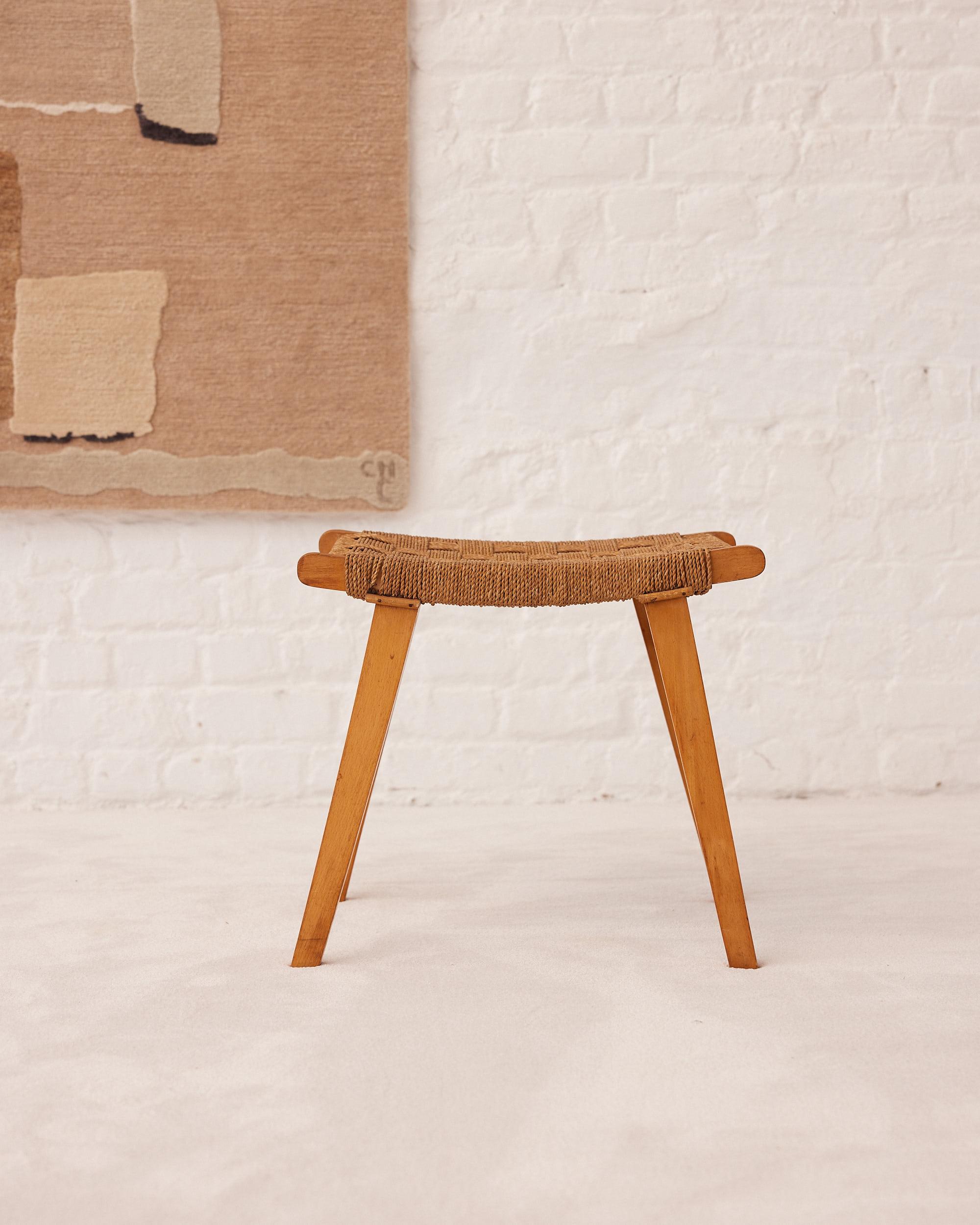 The Braided Stool by Erich Dieckmann, dating back to the 1920s, is an iconic piece of furniture that combines function and style in a unique way. Dieckmann was a leading figure of the Bauhaus movement, and this stool exemplifies the movement’s ethos