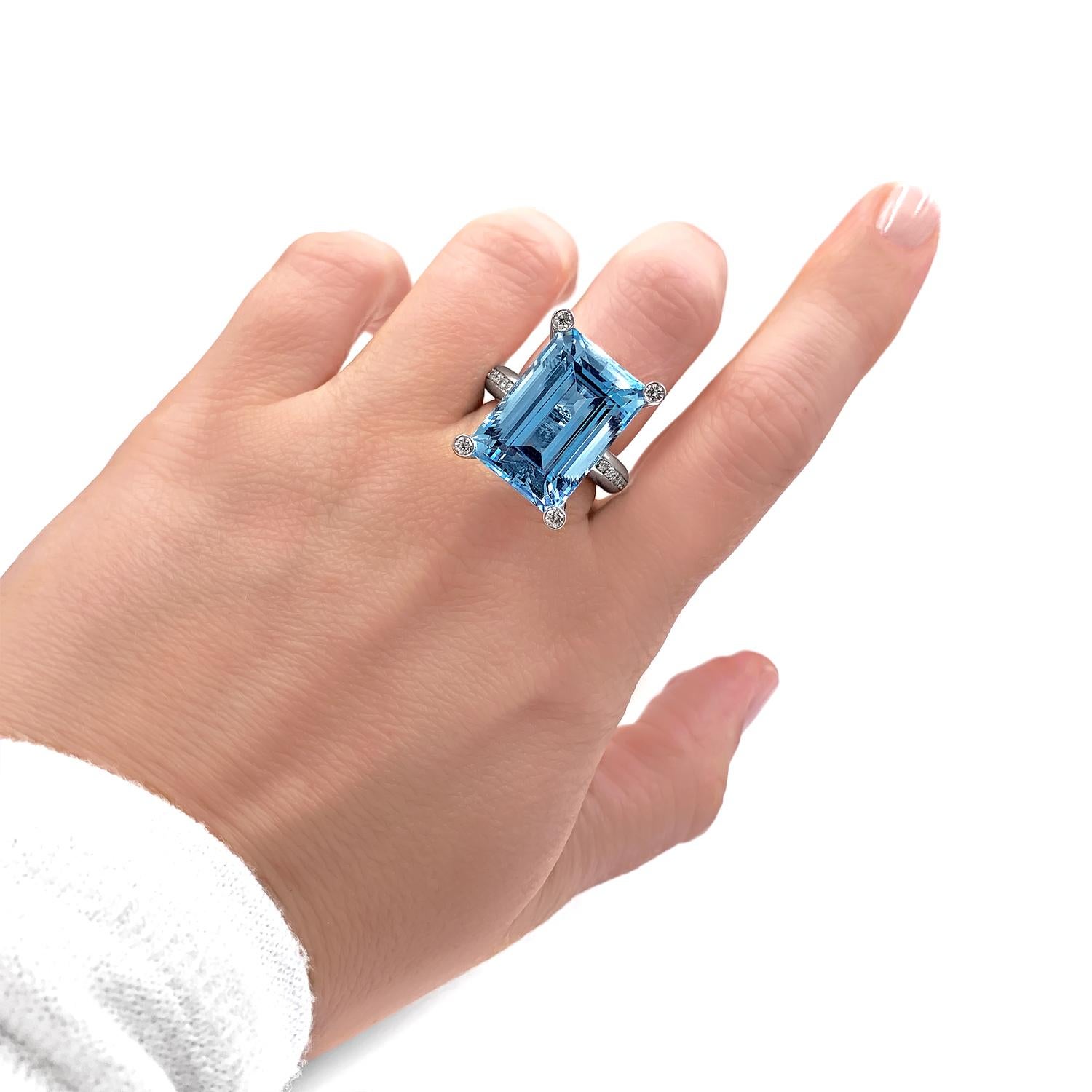 One-of-a-Kind Princess Ring handcrafted in Germany by master metalsmith and gem-cutter Erich Zimmermann in high-polished platinum showcasing a top quality, exceptional 20.57 carat emerald-cut aquamarine (19mm x 13.3mm) invisibly-set in four