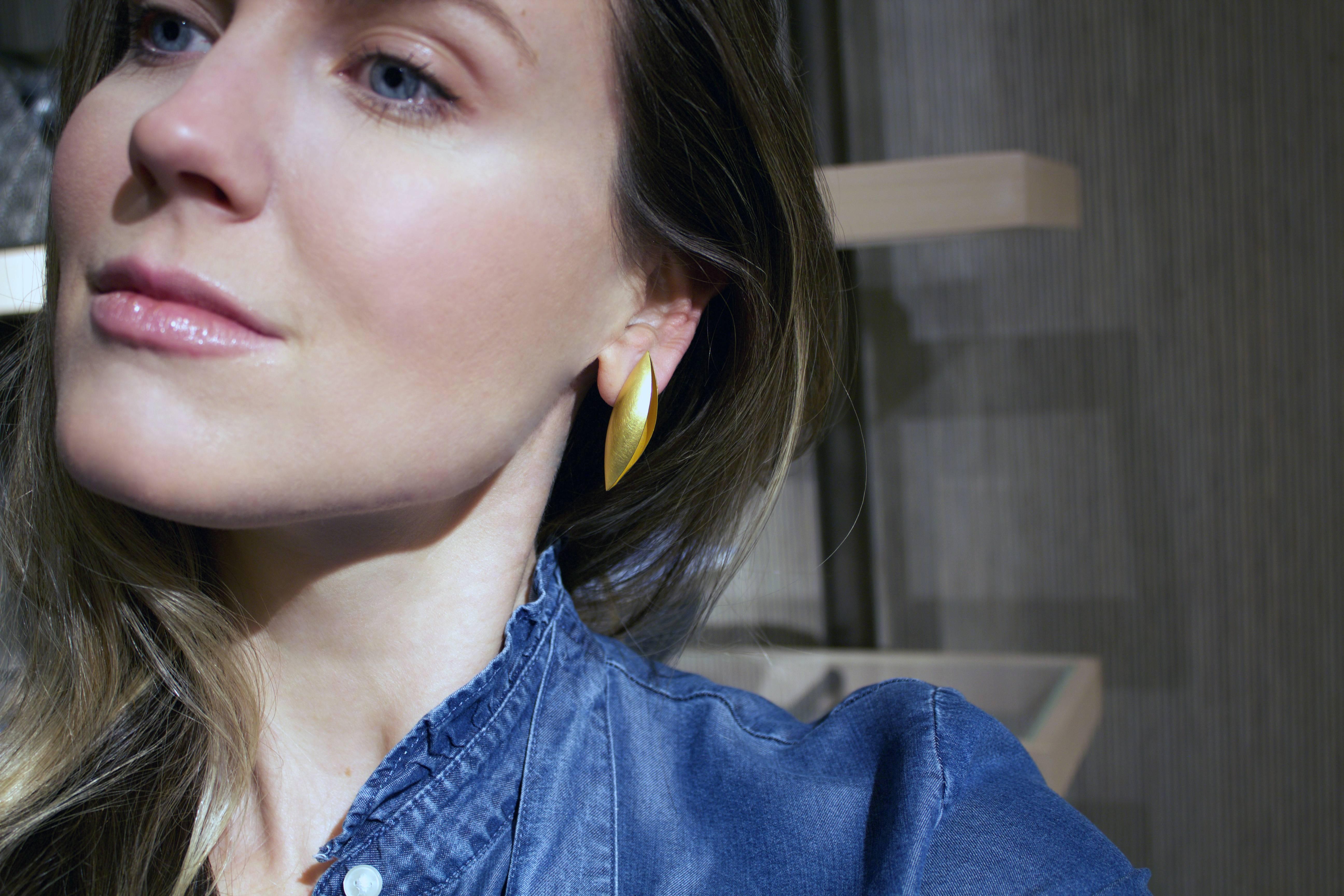 Cocoon Stud Drop Earrings handcrafted in Idar Oberstein, Germany by renowned master metalsmith, gemcutter, and jewelry designer Erich Zimmermann featuring a pair of the artist's signature open cocoon pod elements handmade in matte 18k yellow gold
