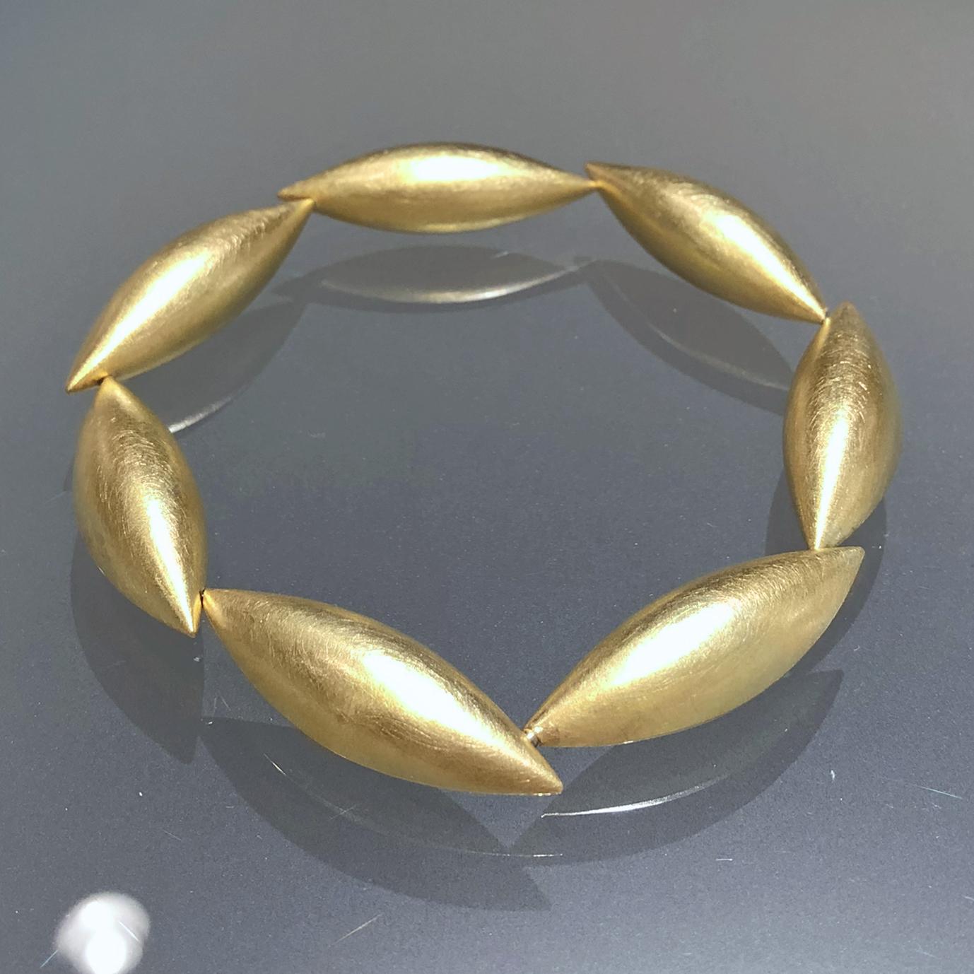 Cocoon Bracelet handcrafted in Germany by acclaimed master metalsmith and jewelry maker Erich Zimmermann in signature-finished 18k yellow gold with a hidden slide clasp. Our best-seller for nearly two decades, Erich's Cocoon collection is elegant,