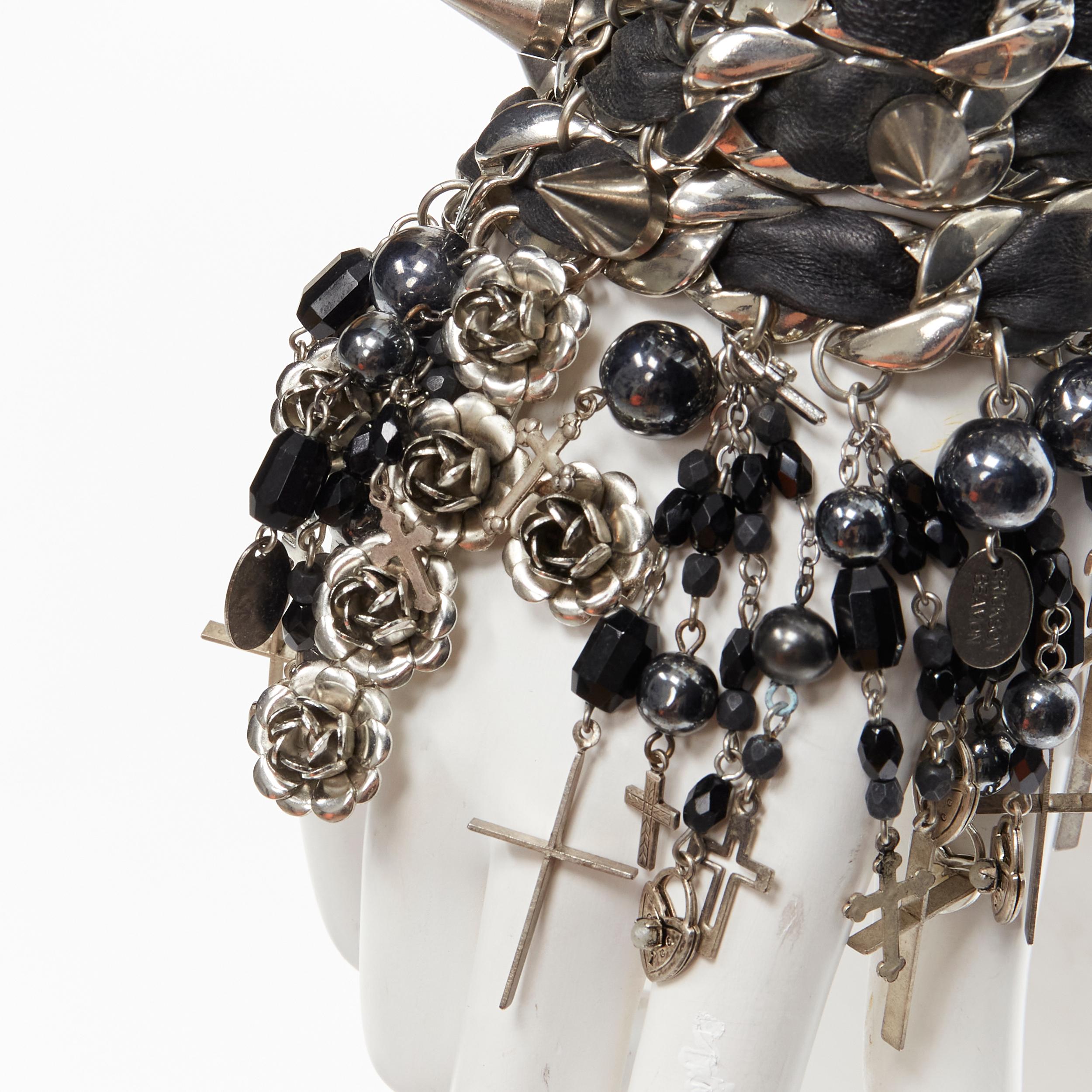 ERICKSON BEAMON black leather silver chain flower cross punk wide bracelet
Reference: ANWU/A00270
Brand: Erickson Beamon
Material: Leather, Metal
Color: Black, Silver
Closure: Lobster Clasp
Extra Details: Silver 3D flower cross, mini crosses and