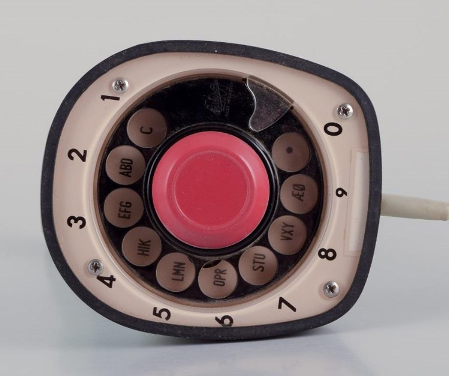 Plastic Ericsson Cobra / Ericofon, analogue telephone in green plastic. 1960s. For Sale