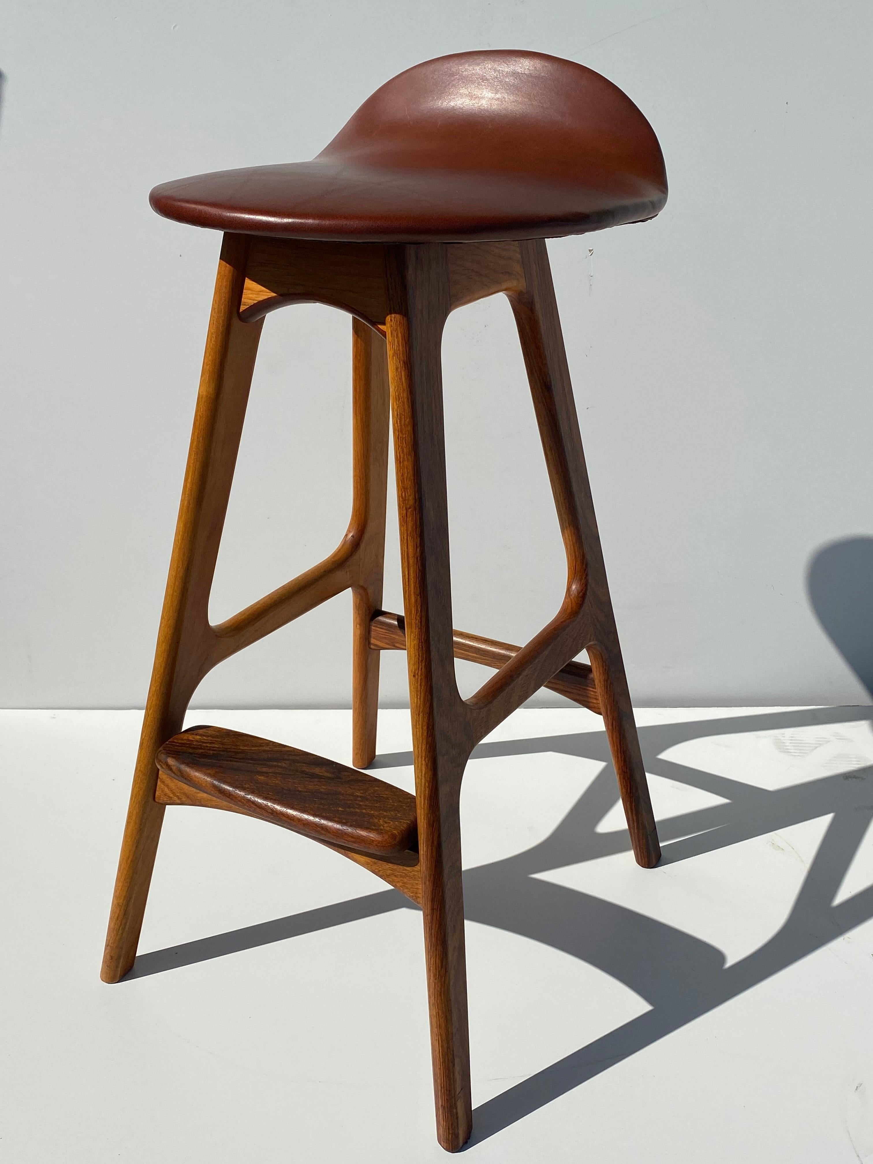 Erik Buch teak bar stool in vintage cognac leather.