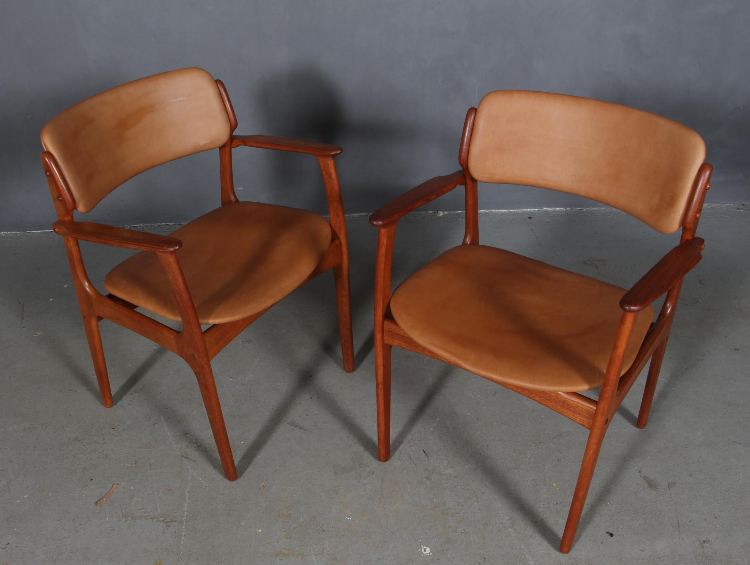 Erik Buch armchair frame of teak.

New upholstered with vintage tan aniline leather.

Model 50 made by Odense Maskinsnedkeri, Denmark.