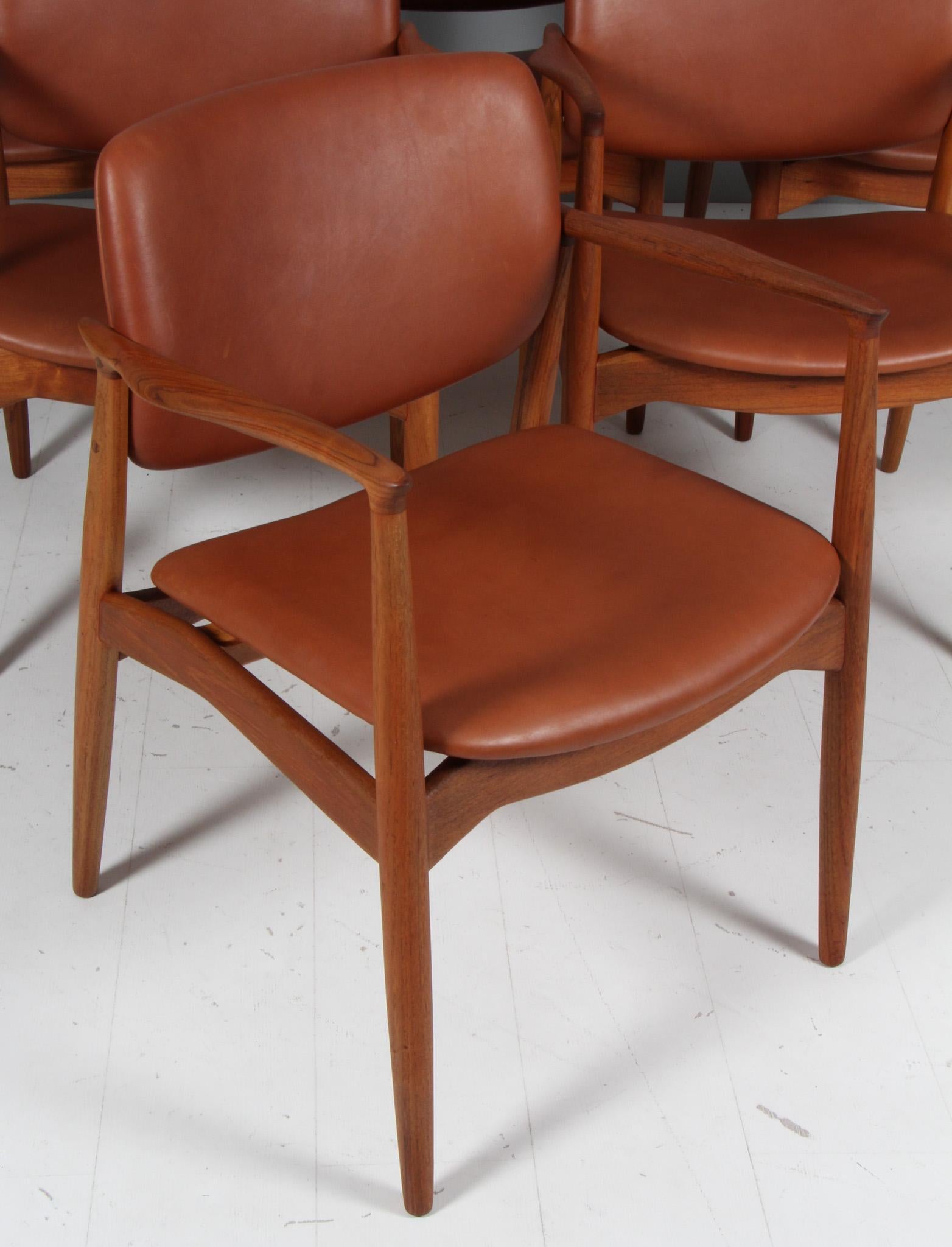 Danois Fauteuils 'Grain' en teck et cuir d'aniline pleine fleur en vente