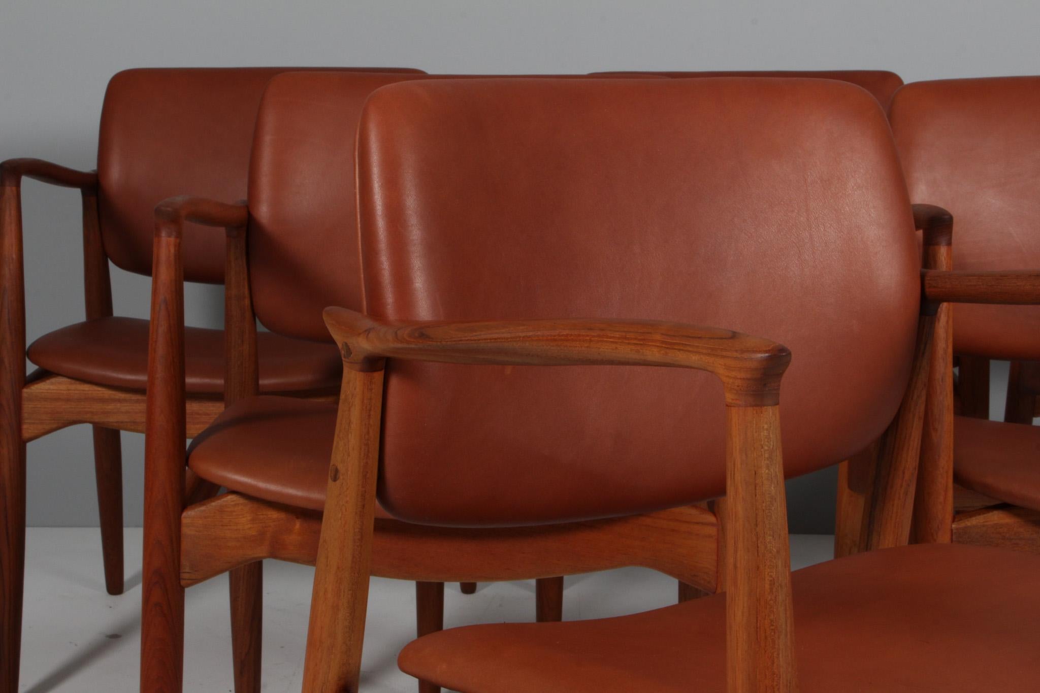Milieu du XXe siècle Fauteuils 'Grain' en teck et cuir d'aniline pleine fleur en vente