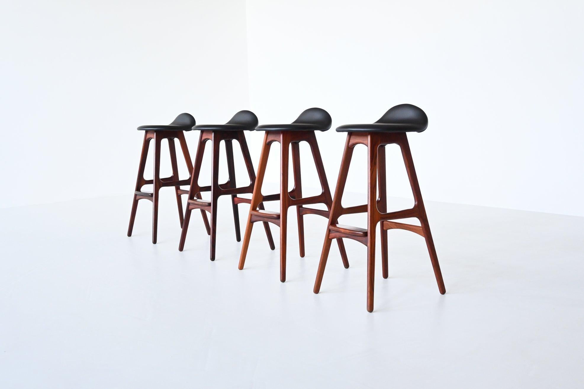 Beautiful shaped iconic bar stools model OD61 designed by Erik Buch for Odense Møbler, Denmark 1965. These well-crafted stools have sophisticated solid rosewood frames. Finished into perfection with nice dovetail connections. The seats are newly