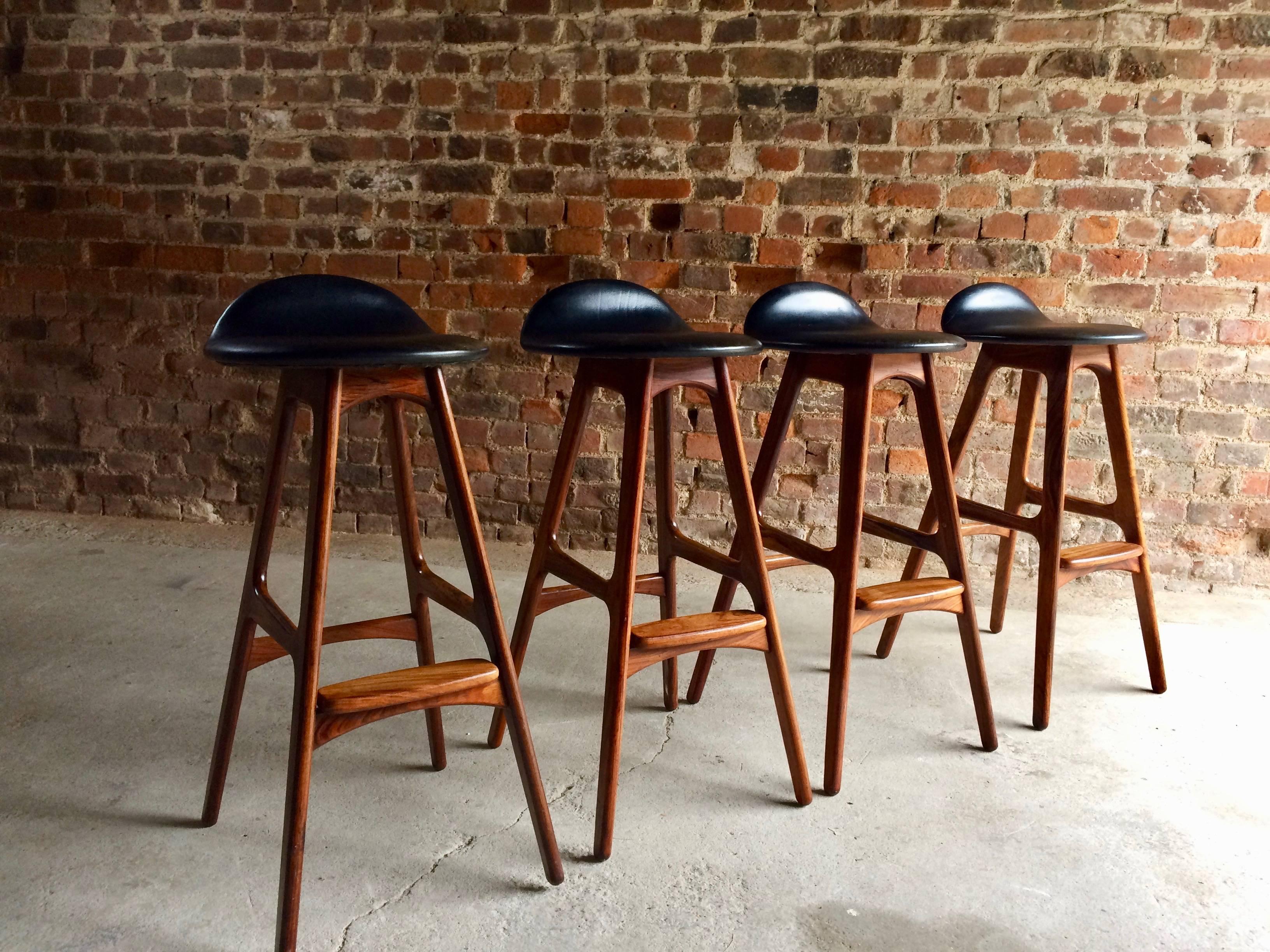 Stunning set of four Erik Buch for O D Møbler rosewood bar stools with black leather seats, circa 1960s, fabulous Danish design at its very best.

Erik Buch
O D Møbler
Rosewood
Bar stools
Set of four
Danish