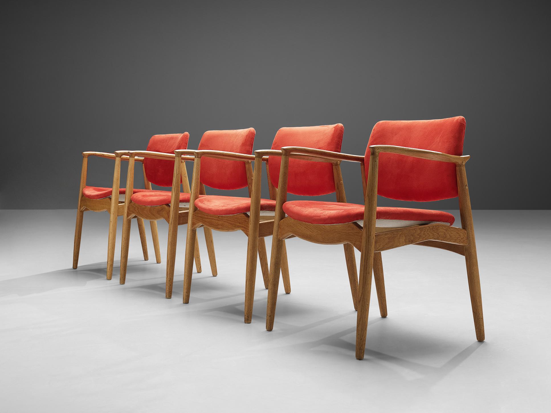 Erik Buch for Ørum Møbler, set of four 'Captains' armchairs, in oak and fabric, Denmark, 1957. 

Set of four sculpted dining chairs in solid oak. These chairs show the characteristics of the well-known model 50 by Erik Buck. Yet this model has a